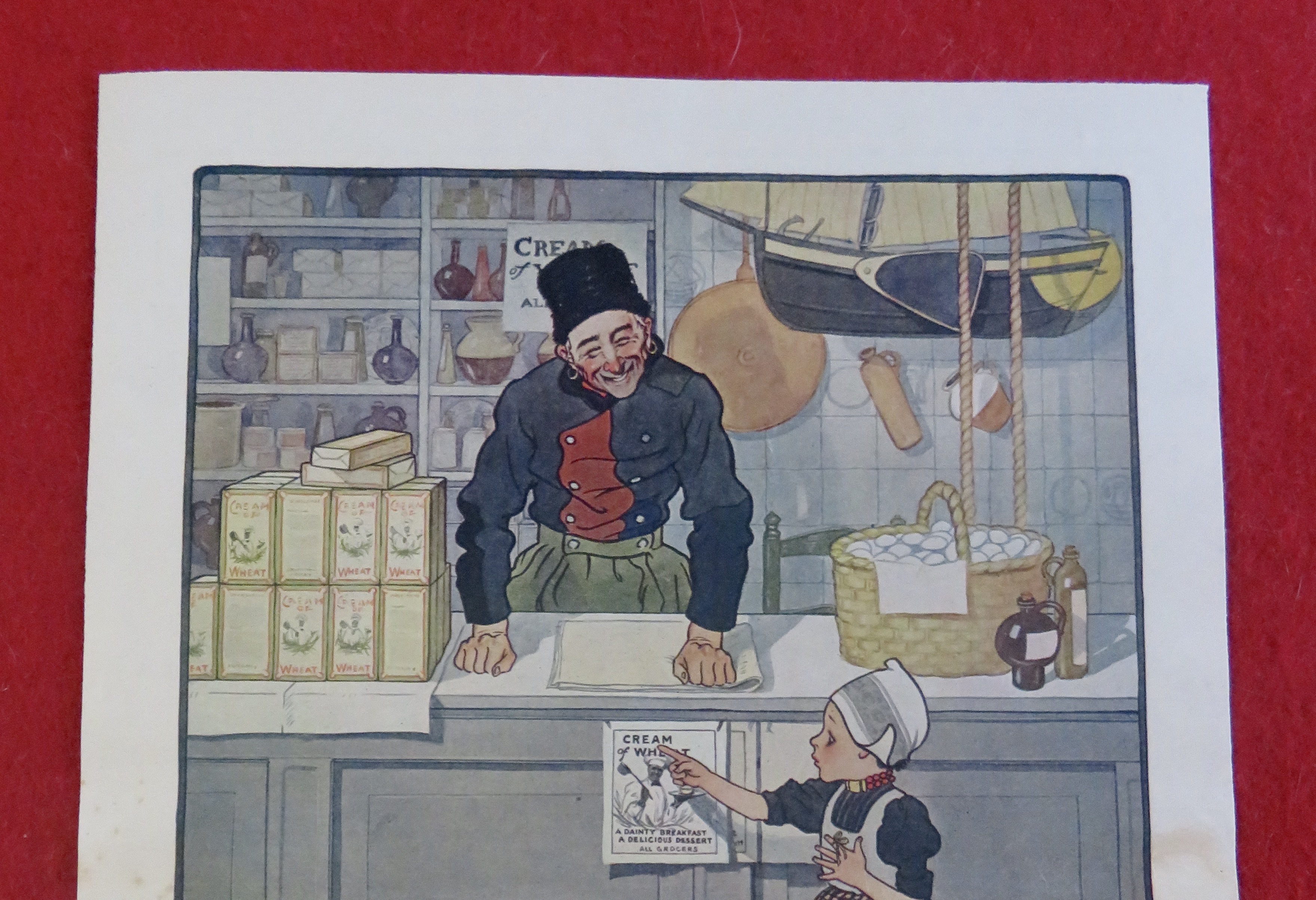 1922 Cream Of Wheat Cereal with Dutch Girl & Grocer