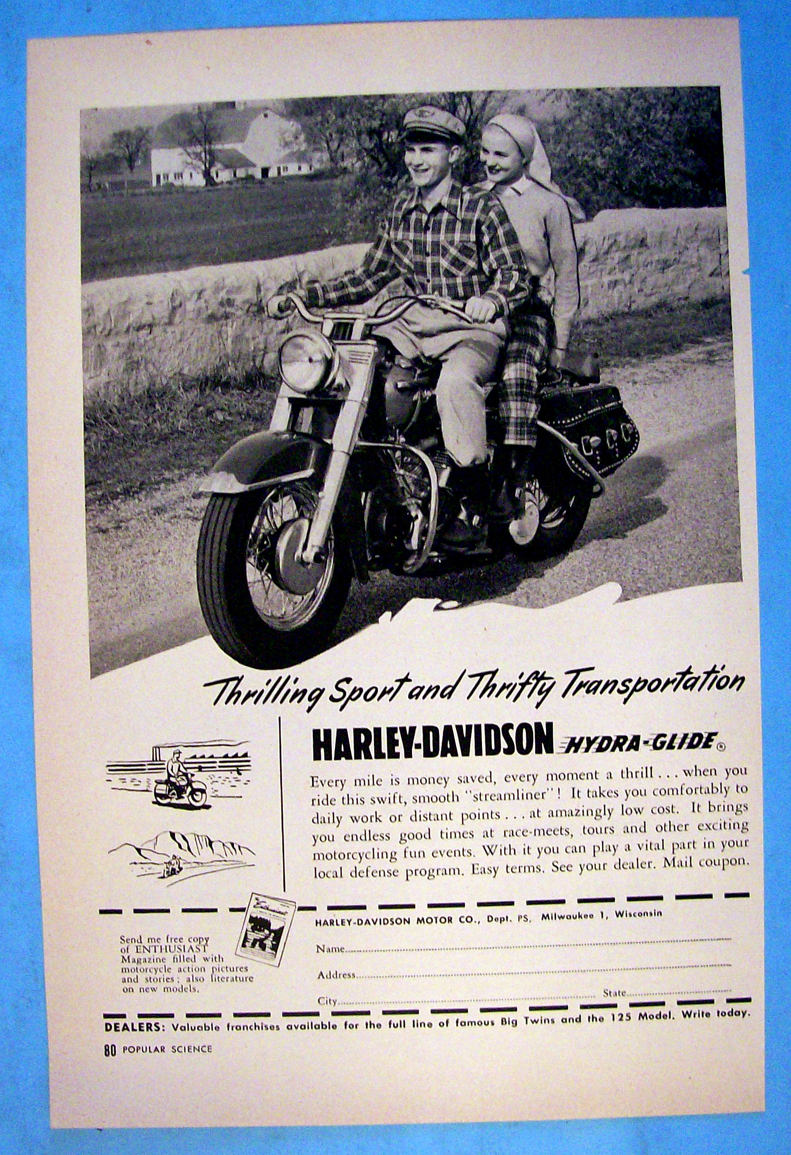 1951 Harley Davidson Hydra Glide Motorcycle with Couple