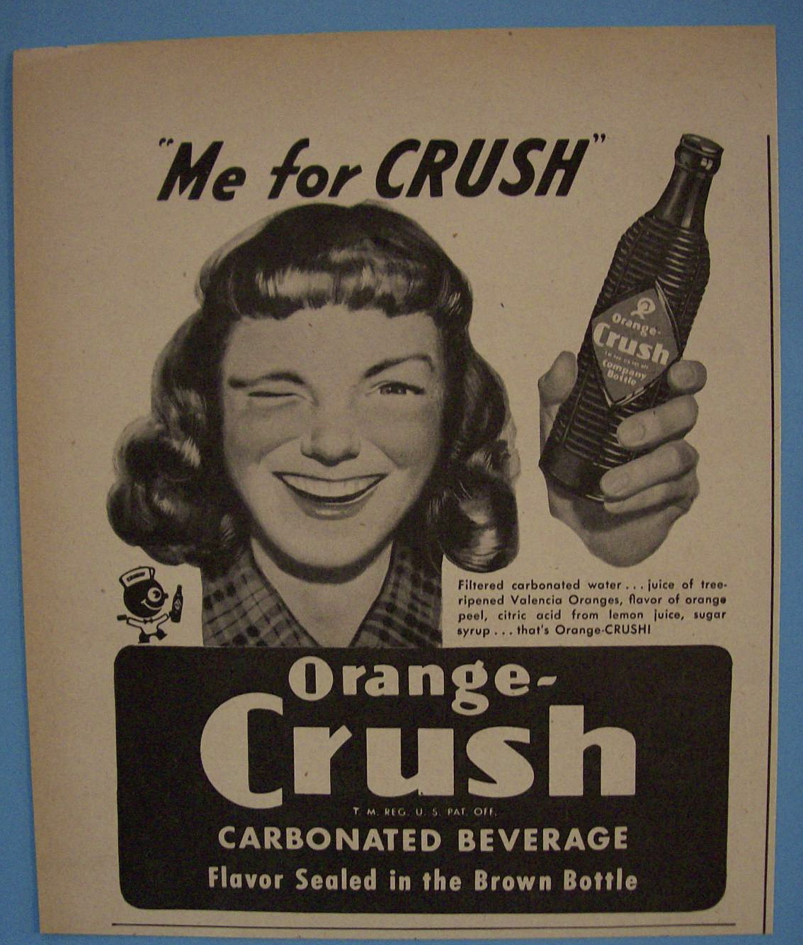 1947 Orange Crush with Woman Smiling & Winking Eye