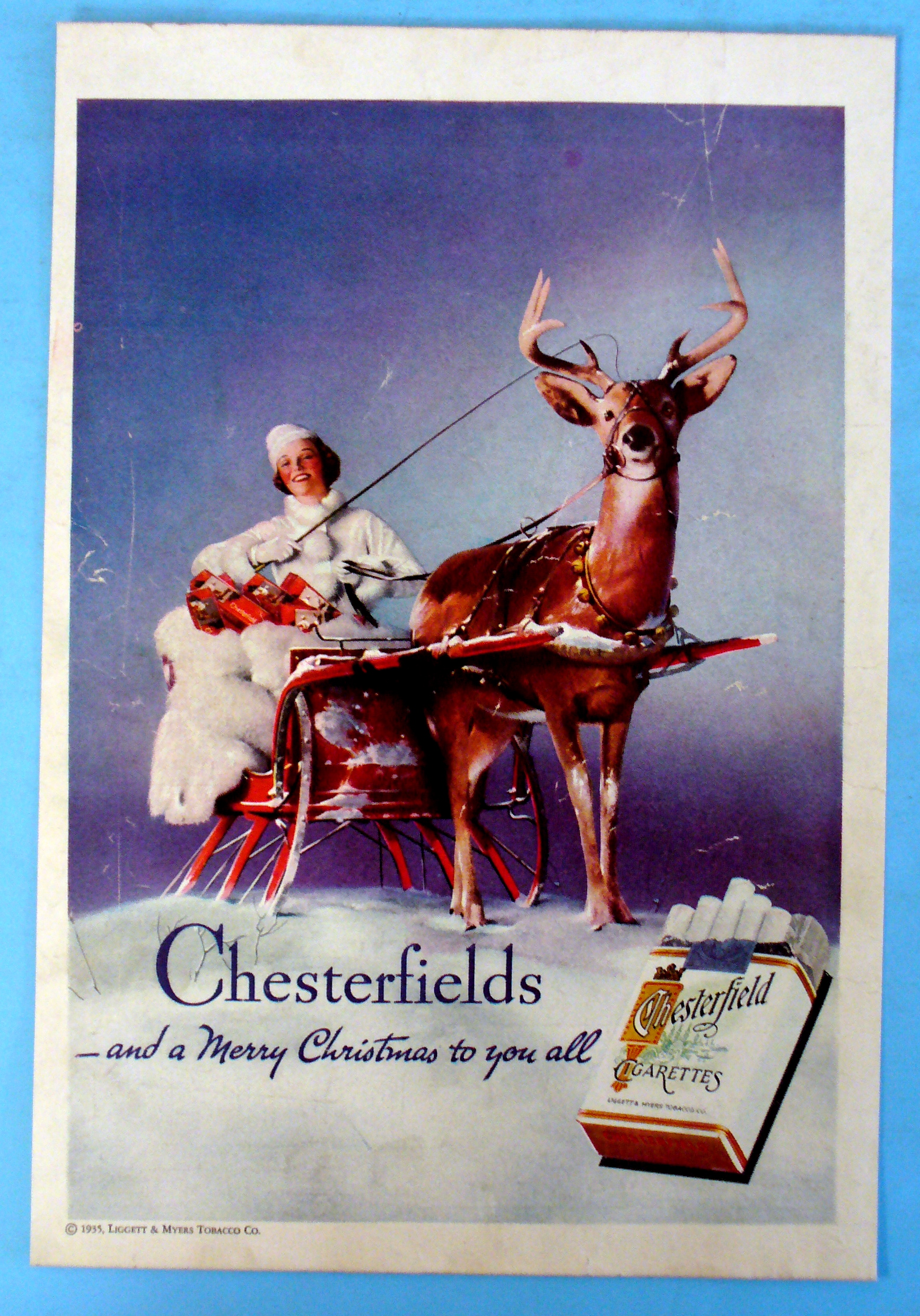 1935 Chesterfield Cigarettes w/Woman In A Sleigh