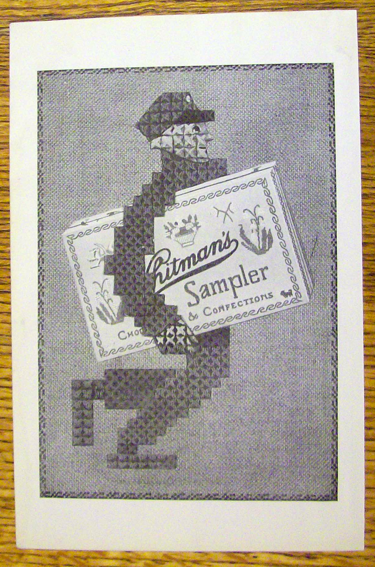 1925 Whitman's Sampler w/Man Carrying Box Of Candy