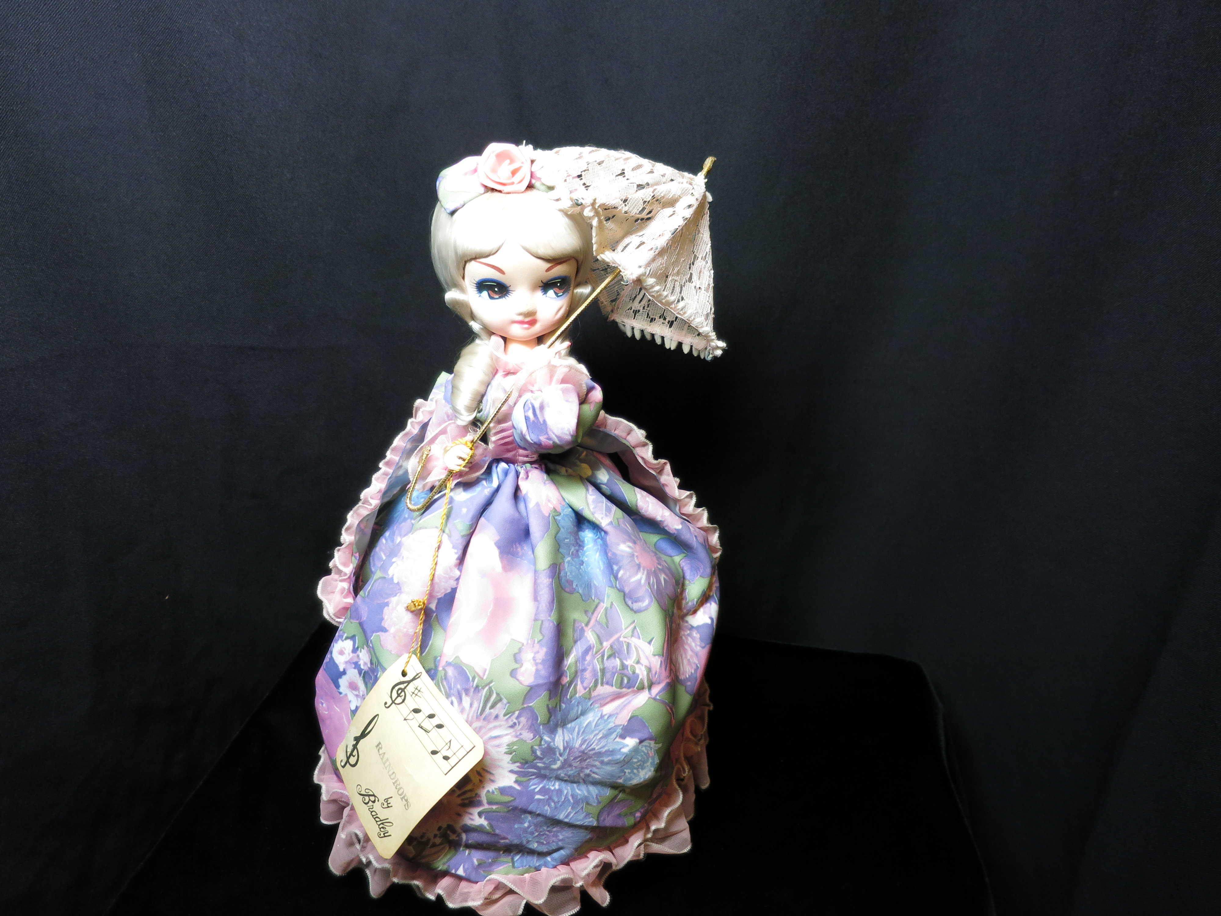 Bradleys Musical Doll Rotates plays Raindrops