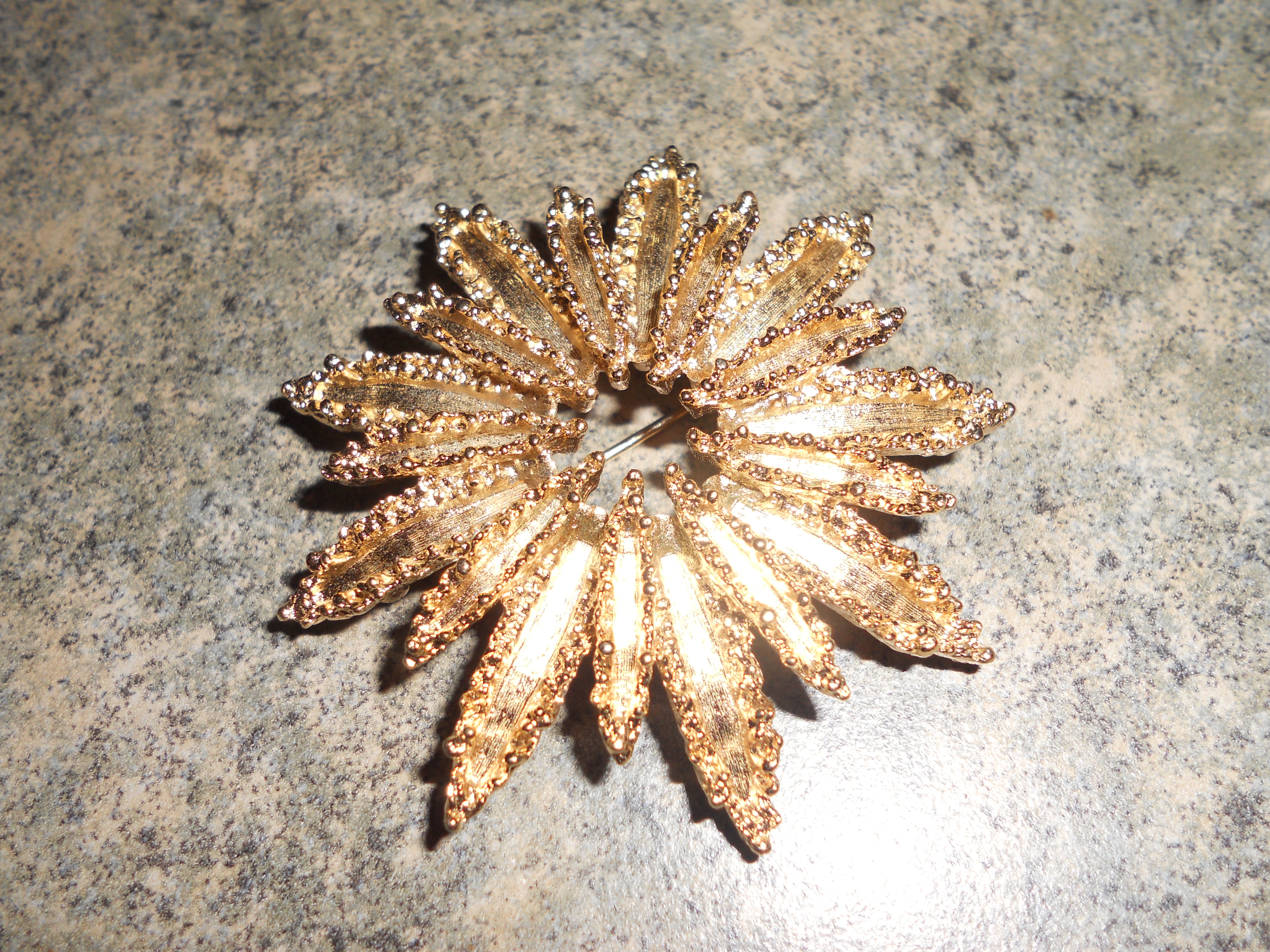 Avon Gold Star Burst Pin Gold Tone 1970s