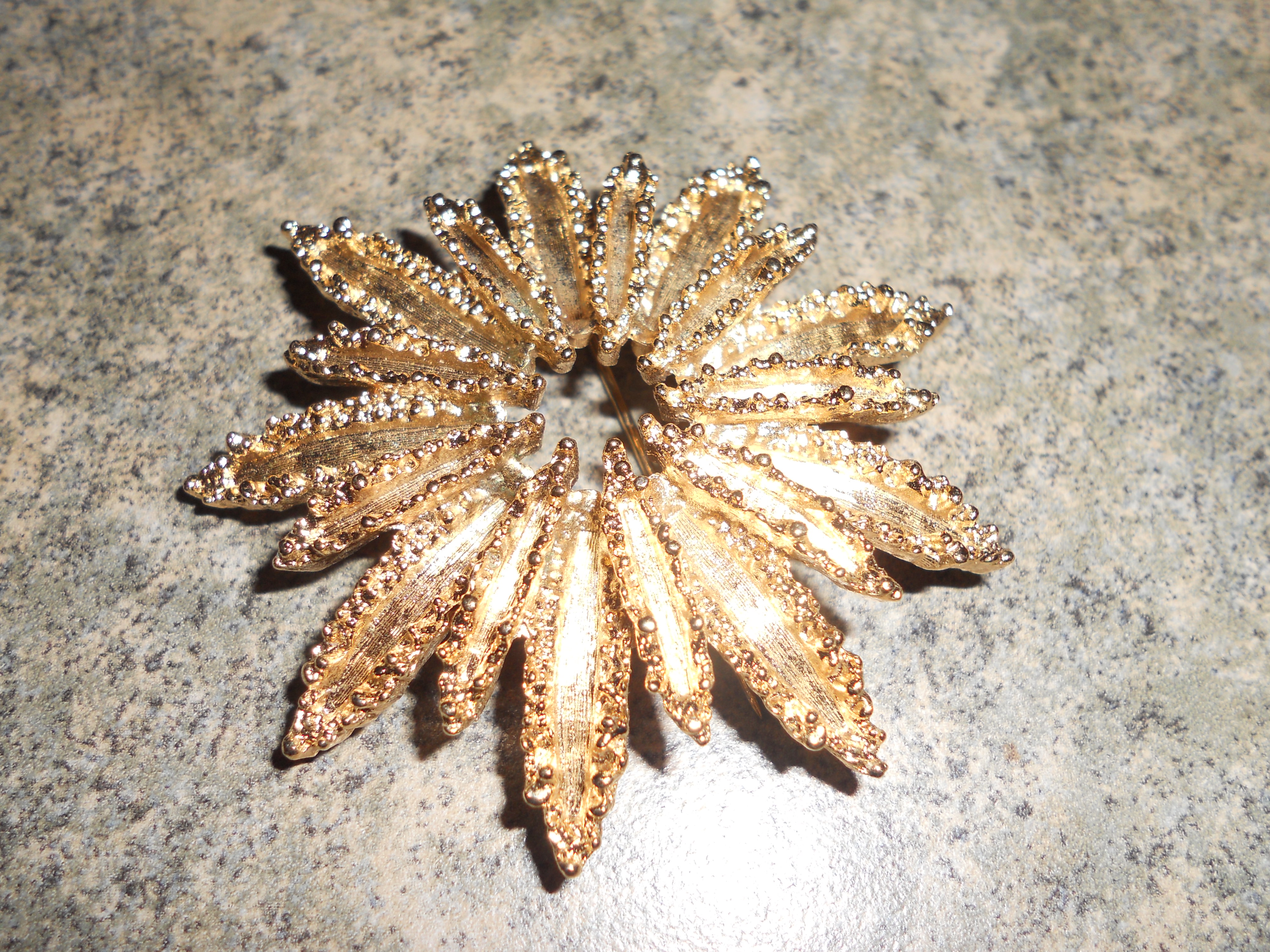 Avon Gold Star Burst Pin Gold Tone 1970s