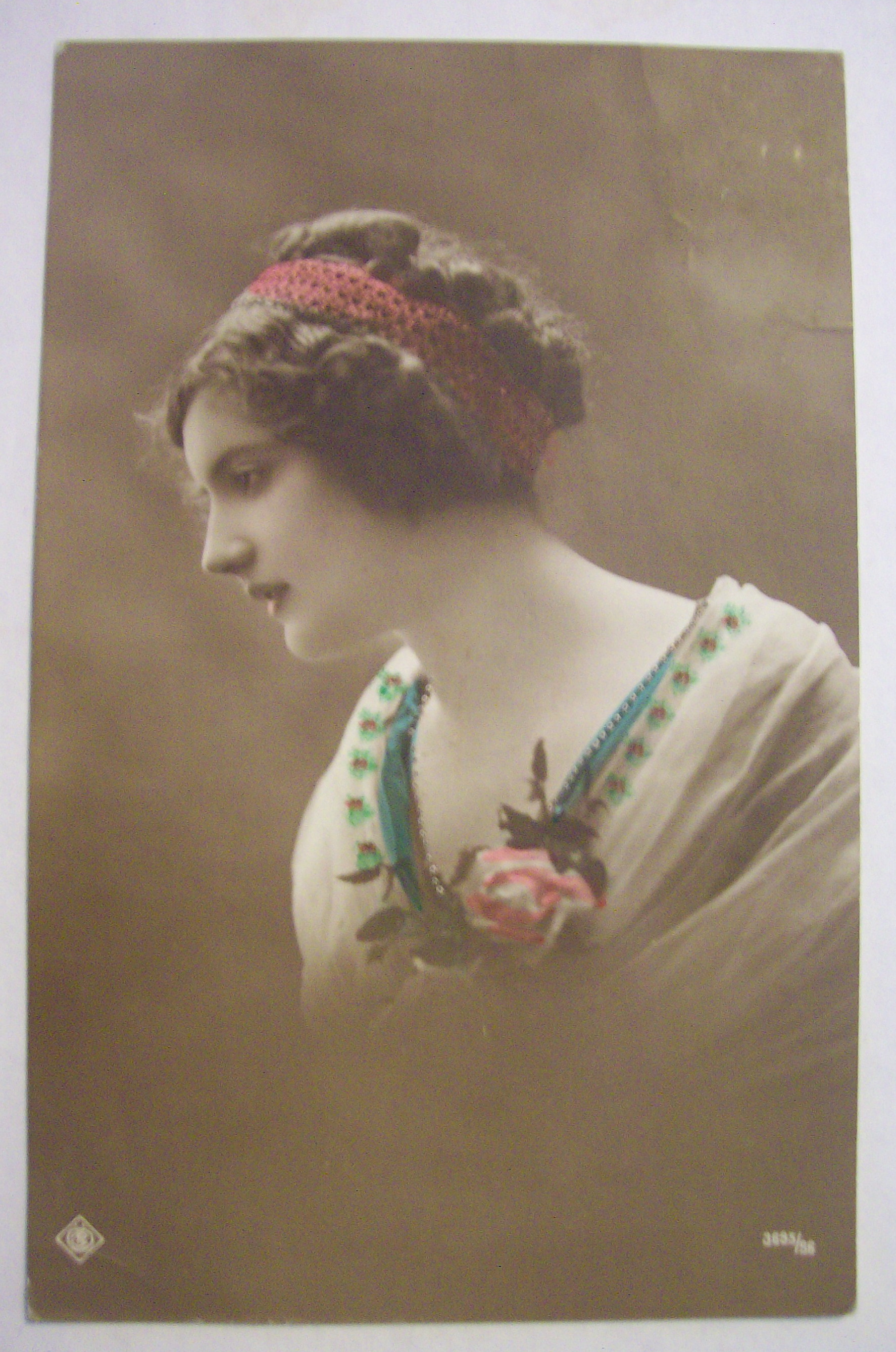 Woman Sitting And Staring Away From Camera Postcard