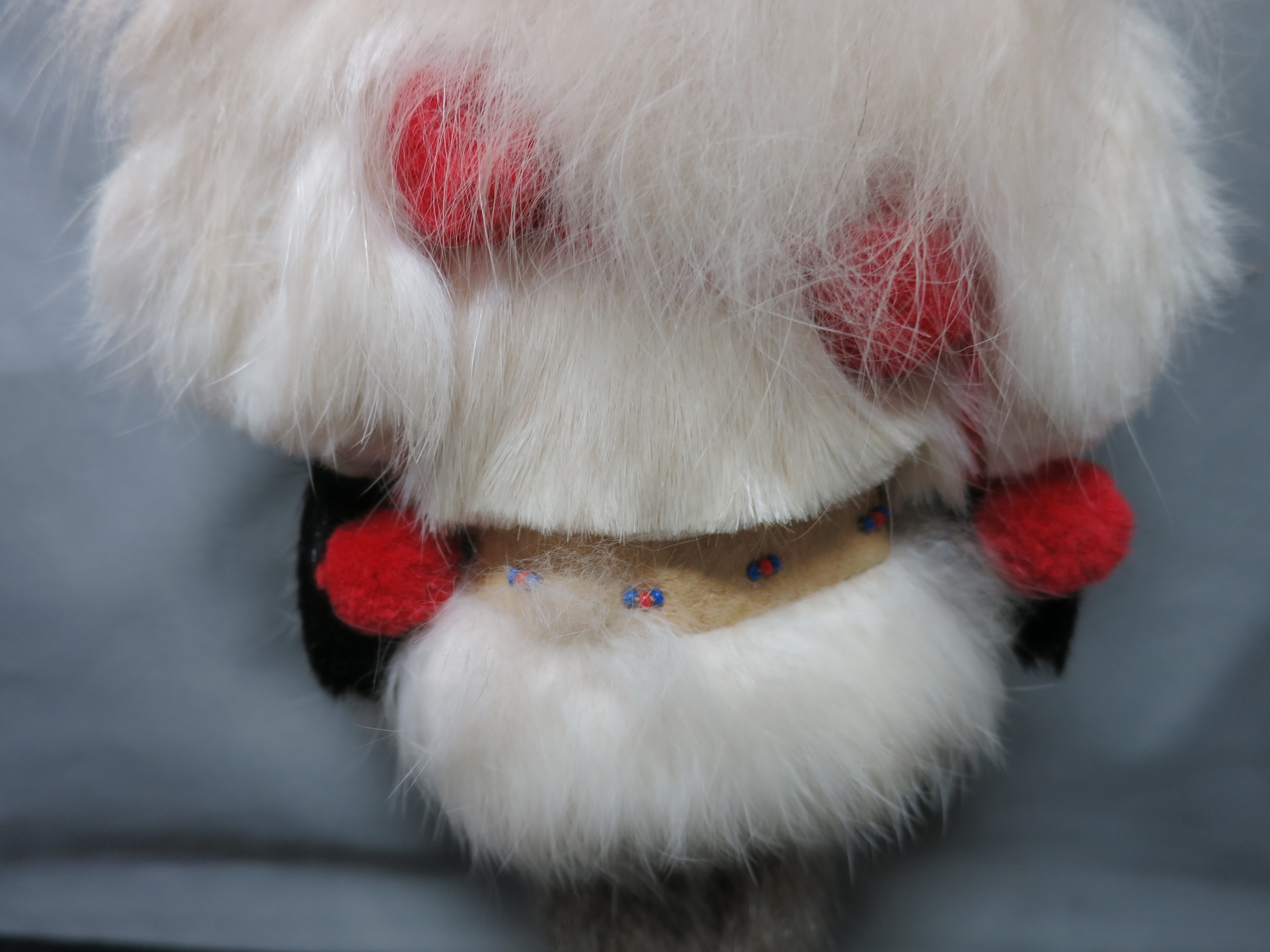 Eskimo Souvenir Doll Celluloid or Ivory Face Rabbit Fur Hand Sewn
