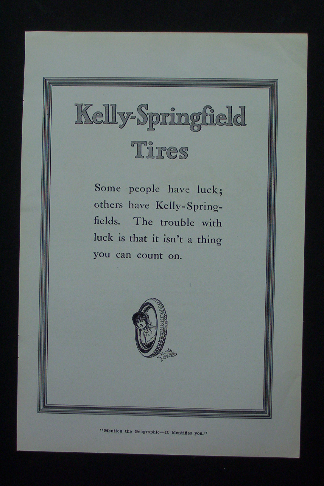 1917 Kelly-Springfield Tires with Woman Inside a Tire