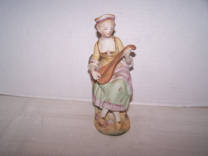 Bisque Lady Figurine Playing Mandolin