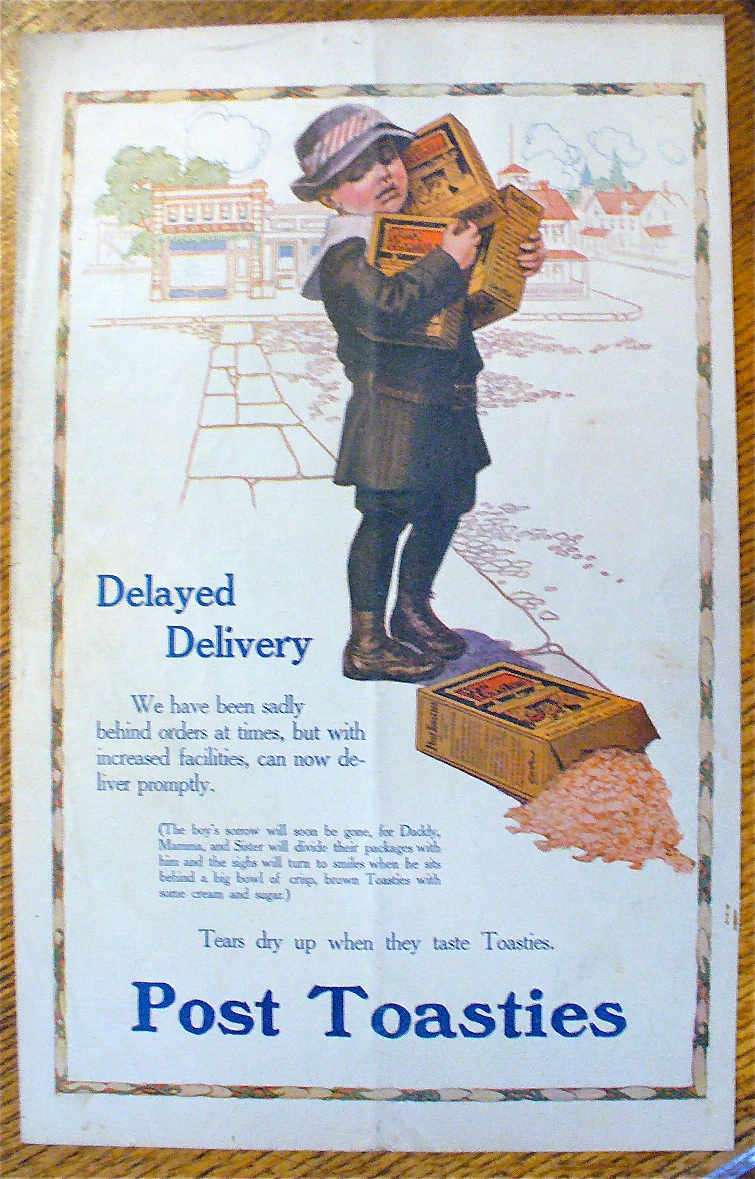 1913 Post Toasties with a Boy Holding 3 Boxes Of Cereal