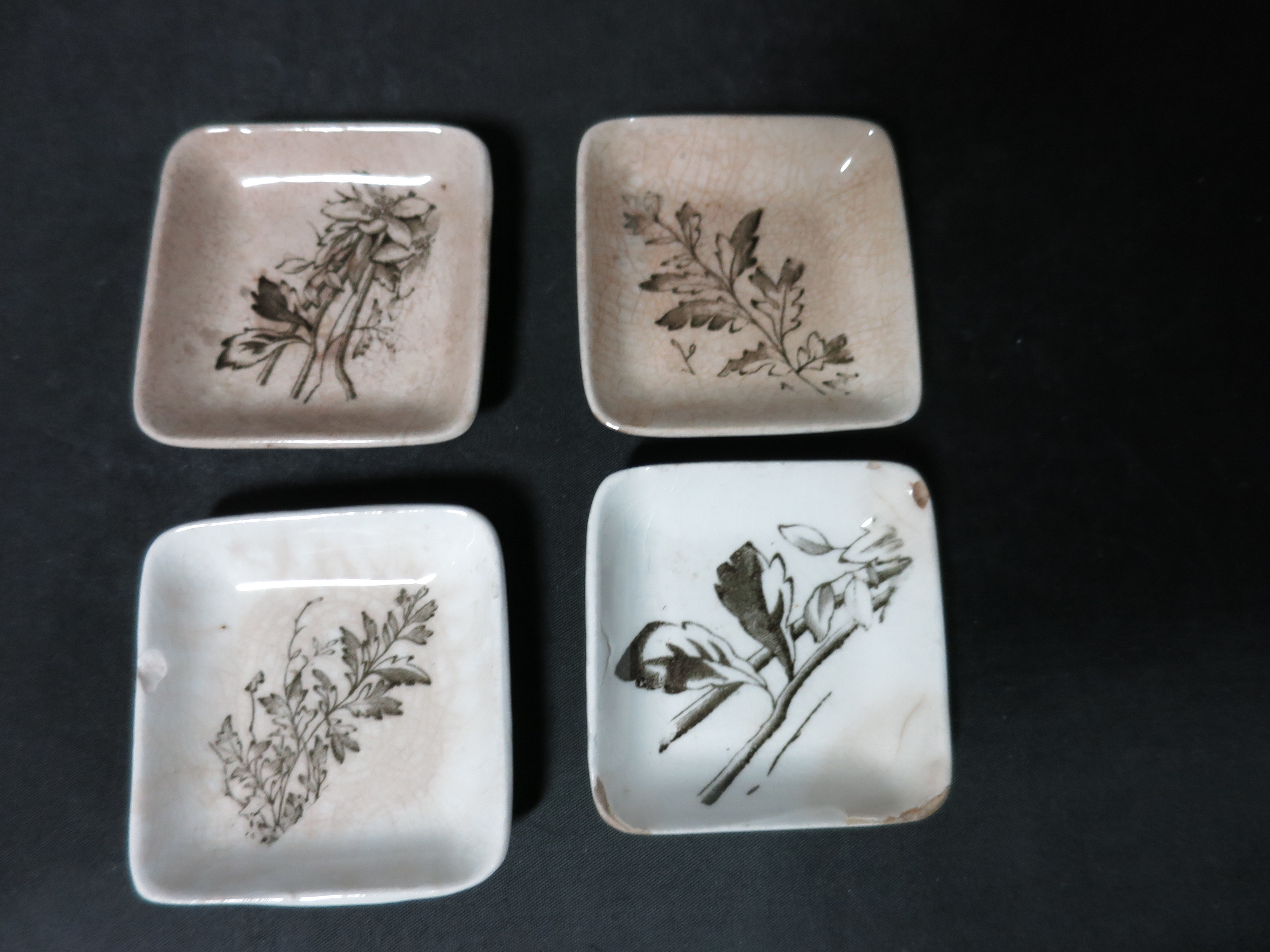 Antique Butter Pat set of four brown floral as is