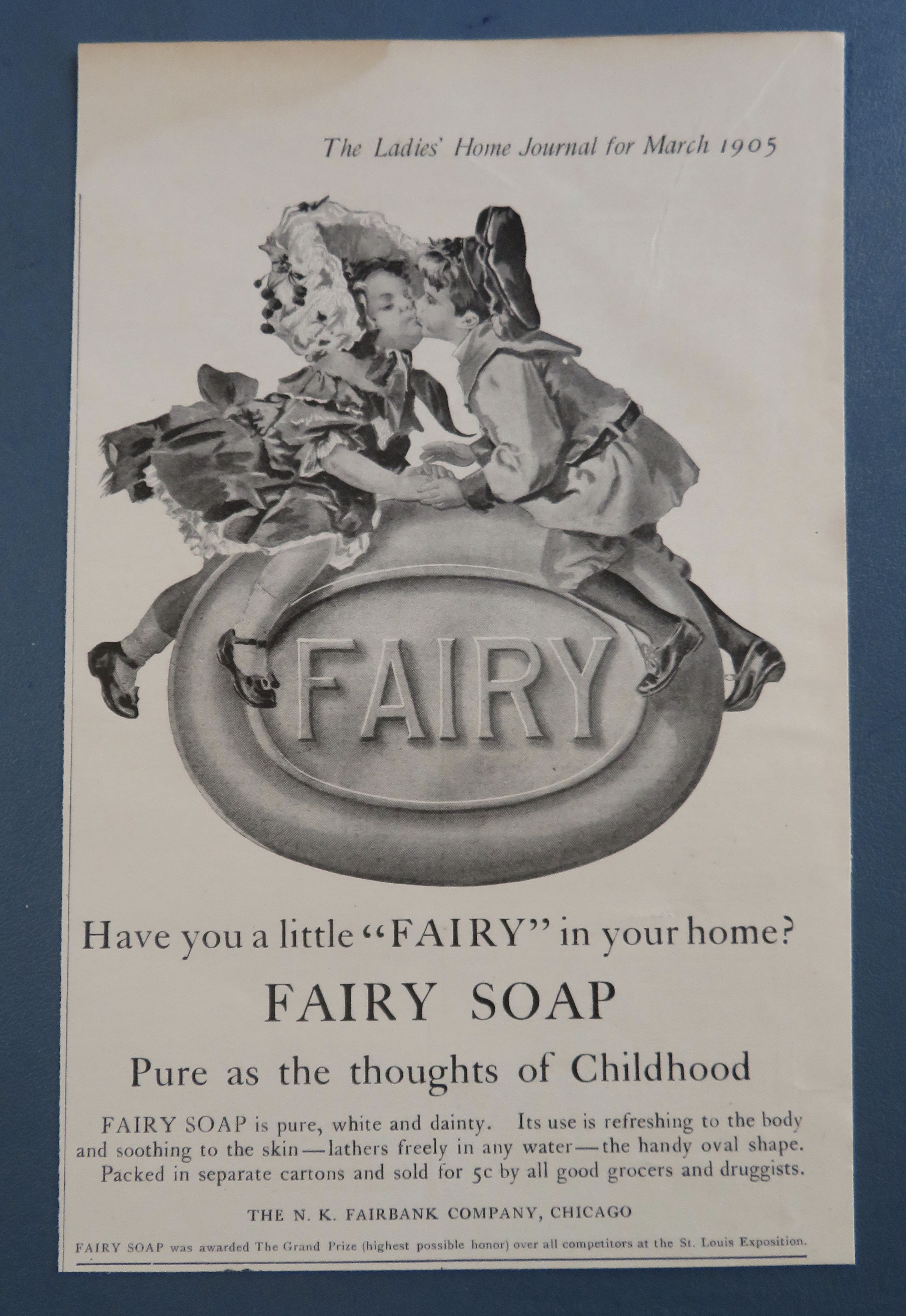 1905 Fairy Soap w/ Boy & Girl Kissing On A Bar Of Soap
