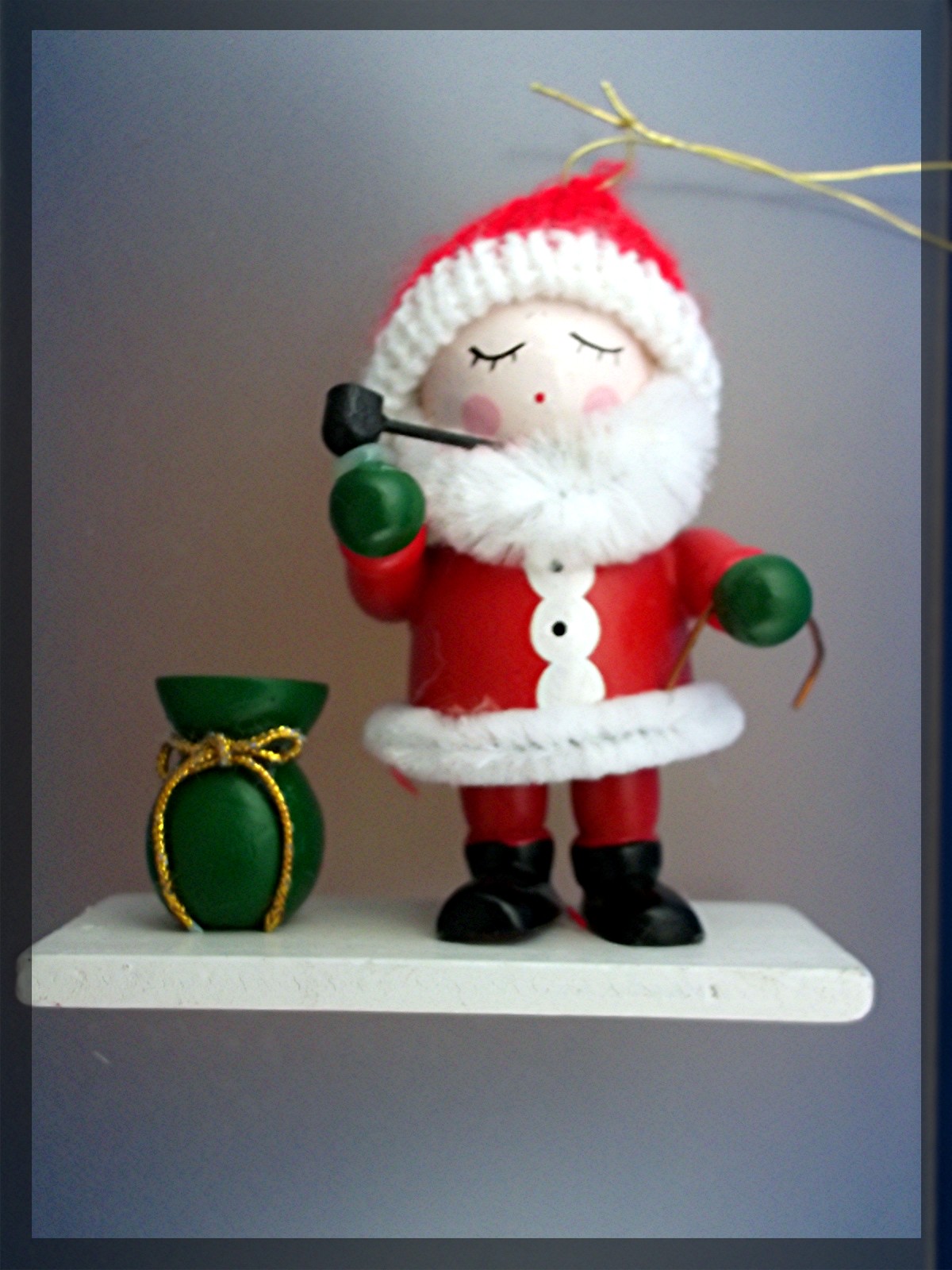 Christmas tree ornament Santa made of wood.