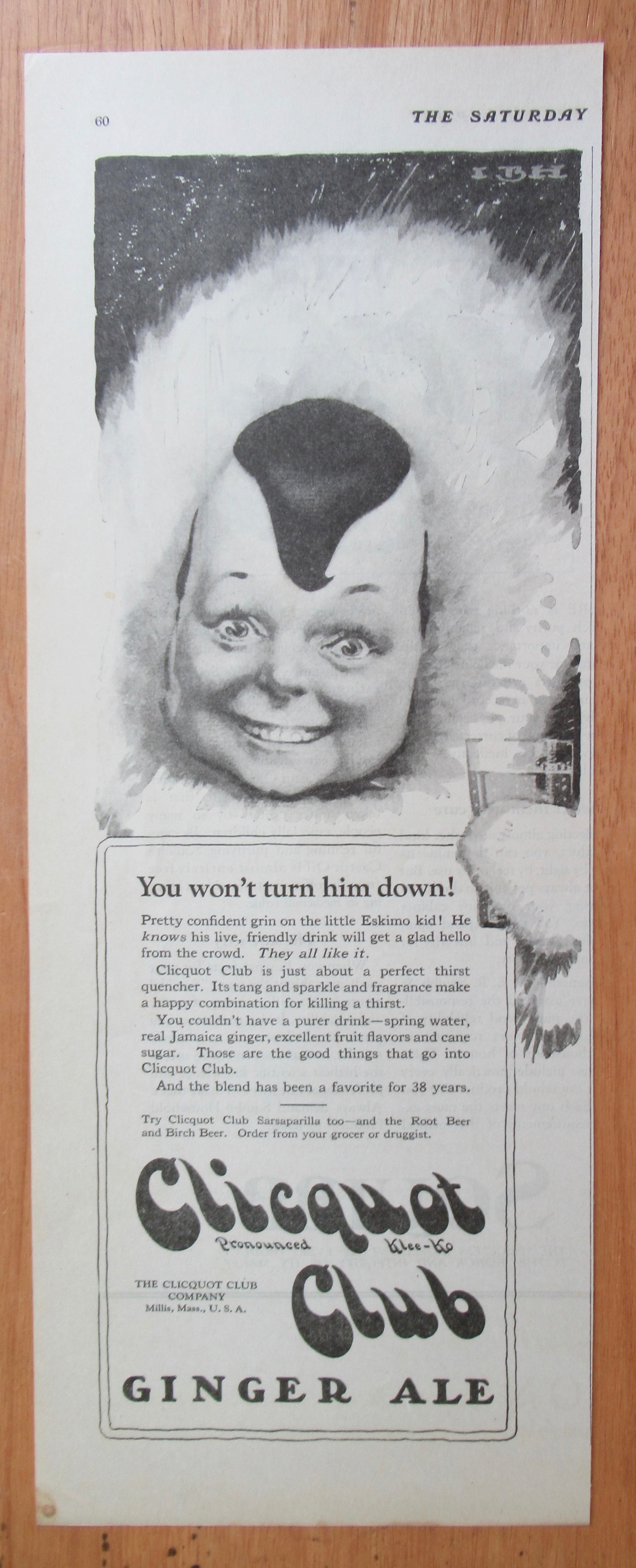 1923 Clicquot Club Ginger Ale with Eskimo Holding Glass