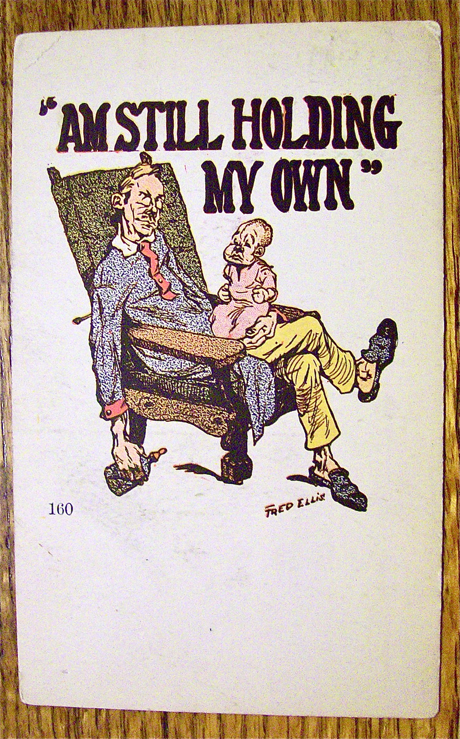 Father Holding A Baby On His Lap Postcard