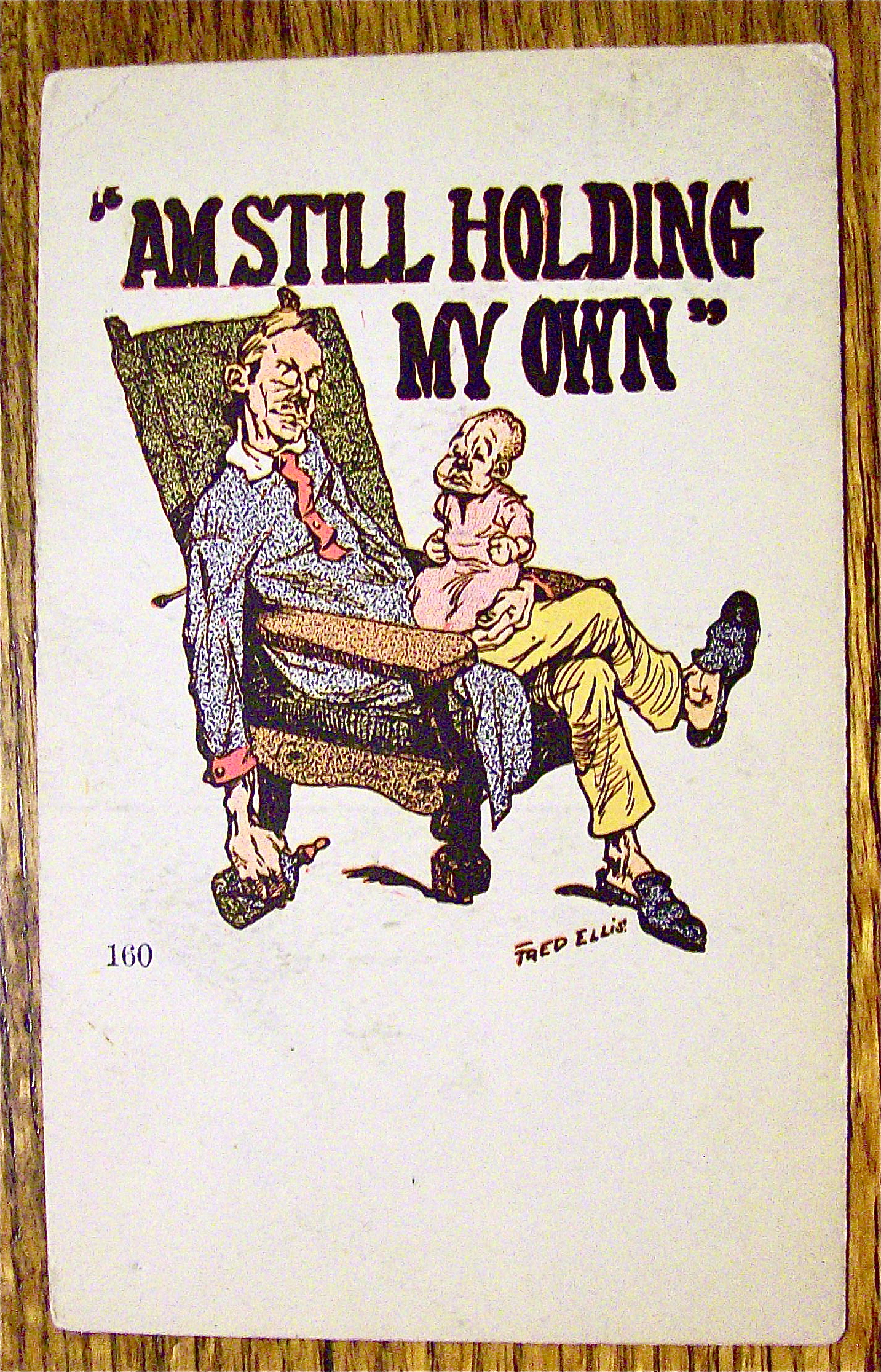 Father Holding A Baby On His Lap Postcard