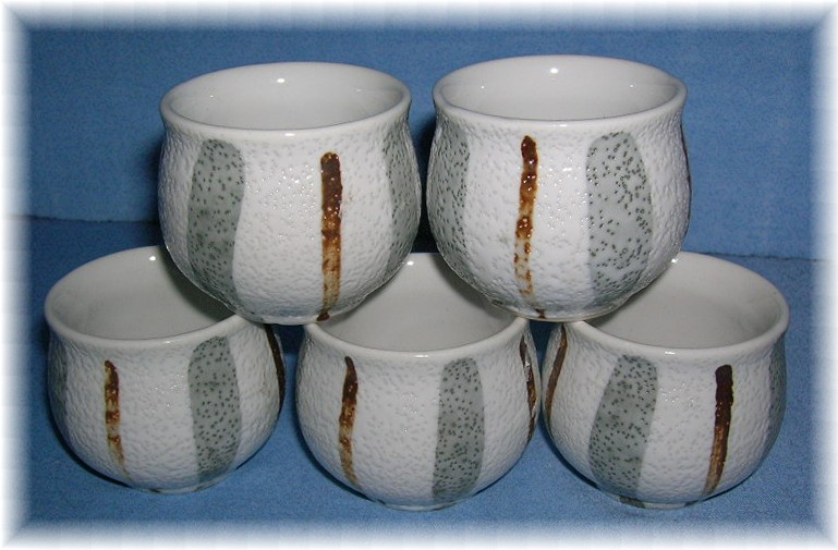 5 Grey/Tan Pottery Egg Cups