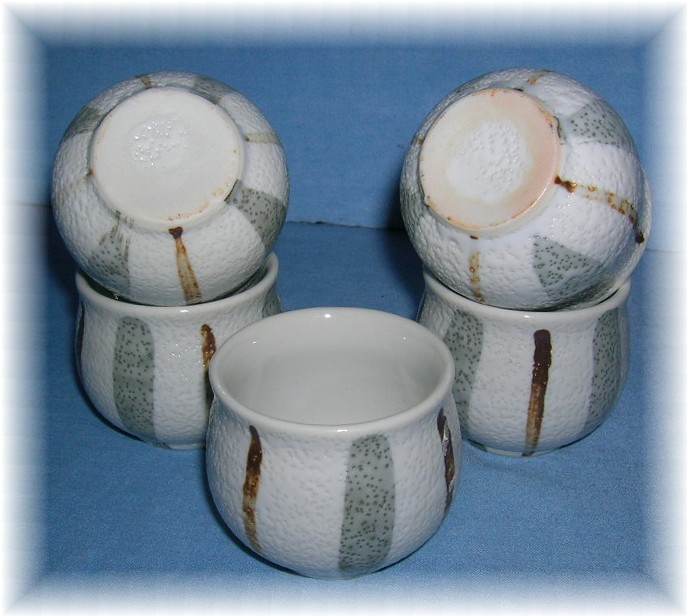 5 Grey/Tan Pottery Egg Cups