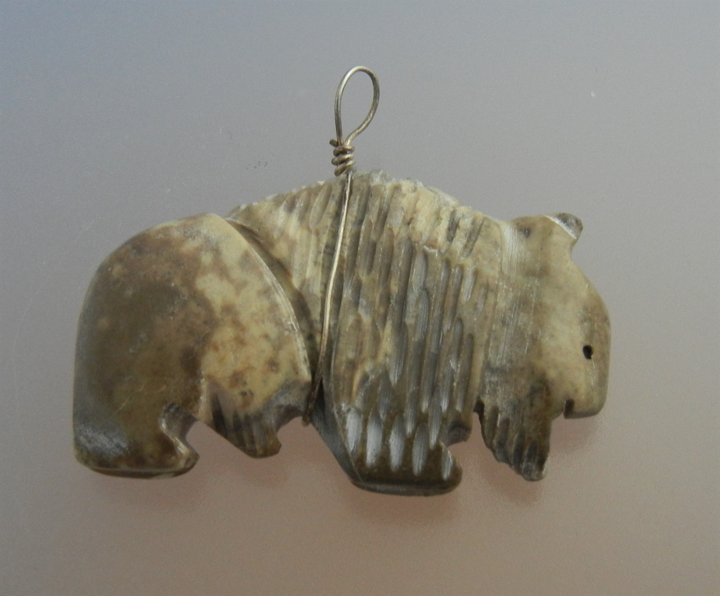 Navajo Carved Buffalo Jasper with Turquoise Pendant