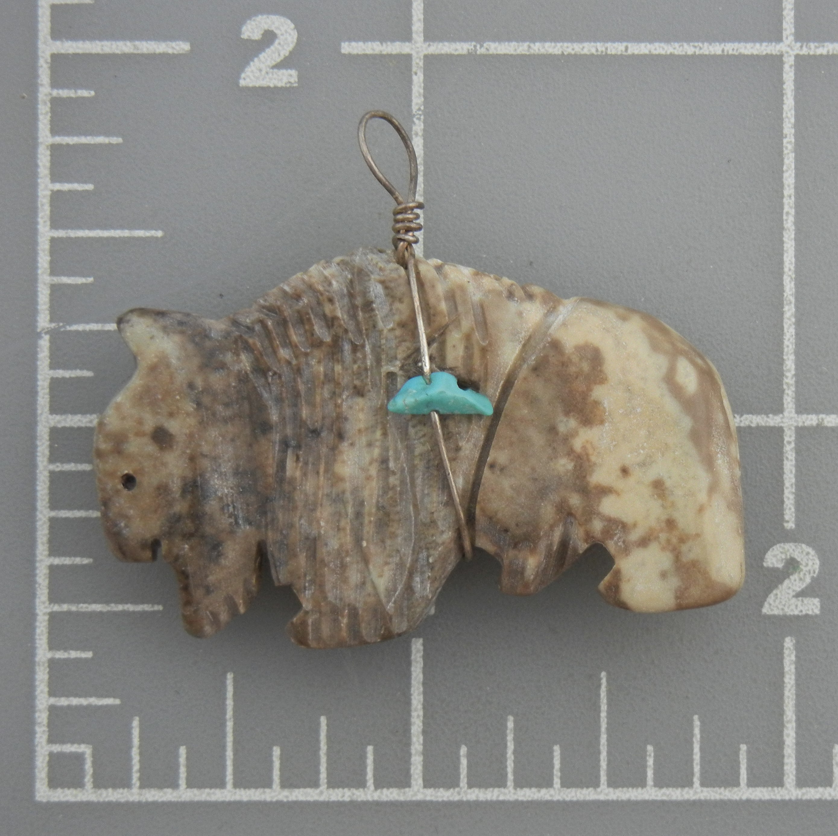 Navajo Carved Buffalo Jasper with Turquoise Pendant