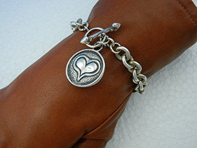EXEX Sterling Silver Heart Charm Bracelet Claudia Agude