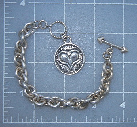 EXEX Sterling Silver Heart Charm Bracelet Claudia Agude