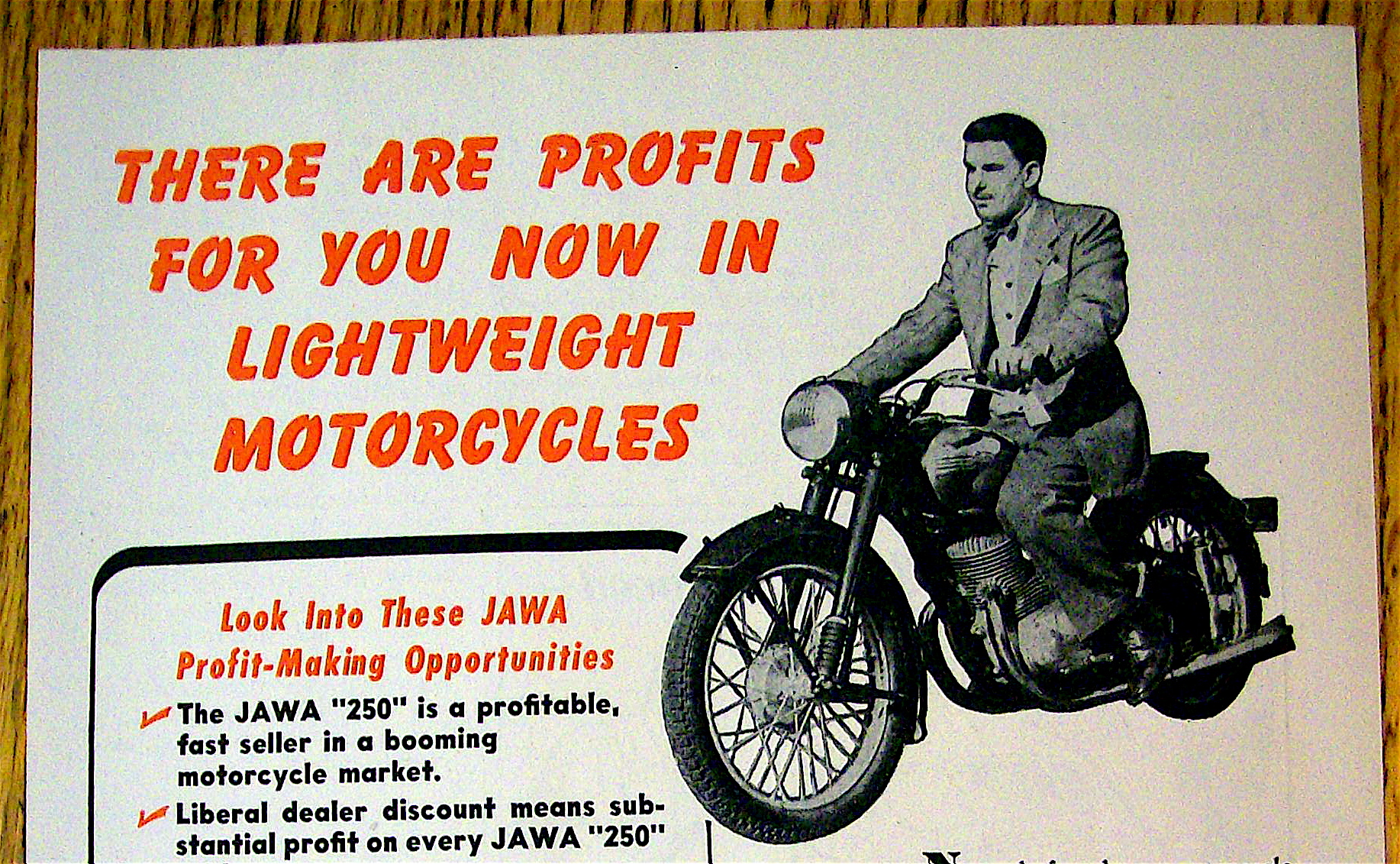 1948 Jawa Motorcycle with Man on Bike