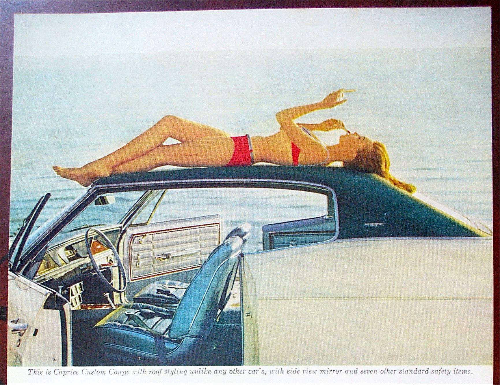 1966 Chevrolet Caprice with Girl Sunbathing on Roof