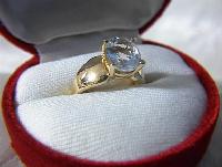 Ring 10 K Yellow Gold Oval Blue Topaz