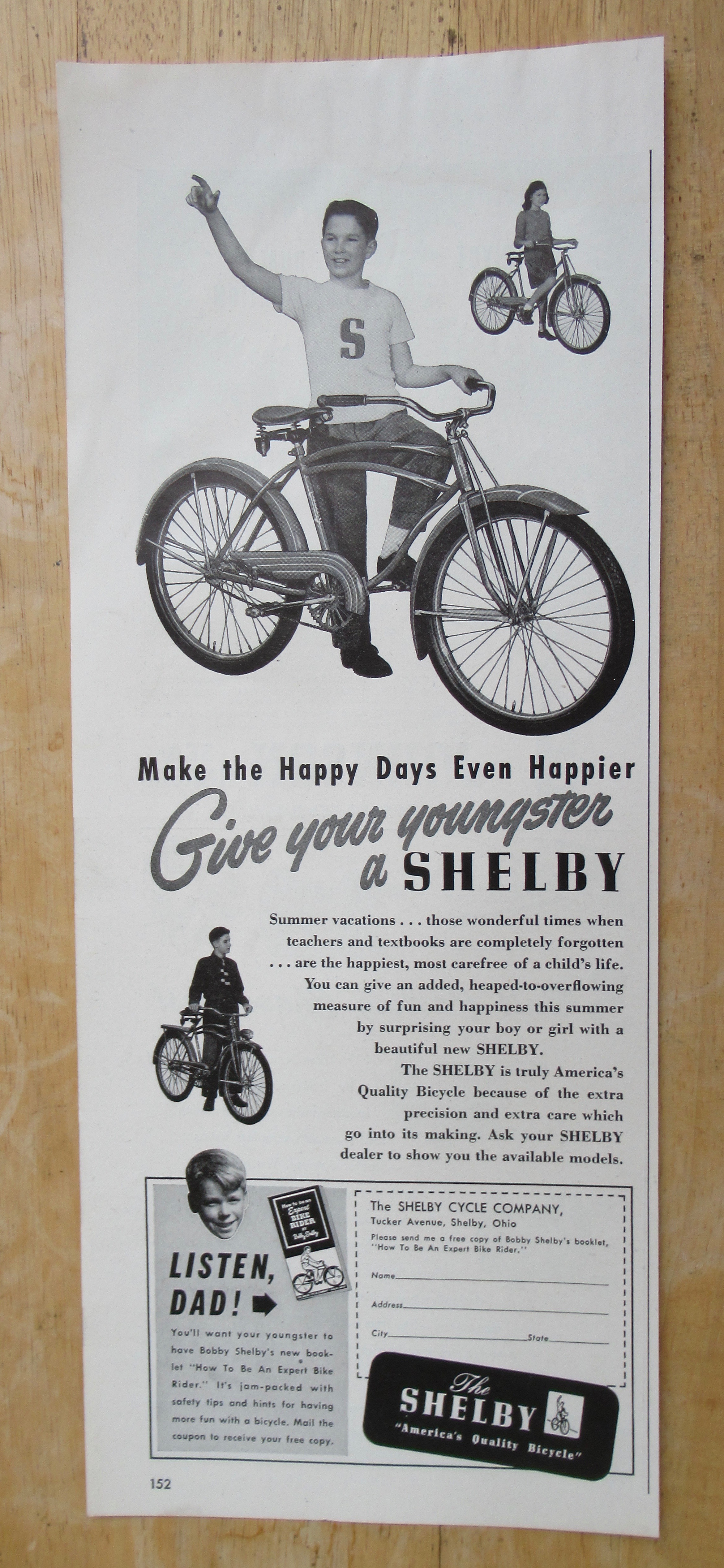 1947 Shelby Bicycle with Boy Standing By His Bike