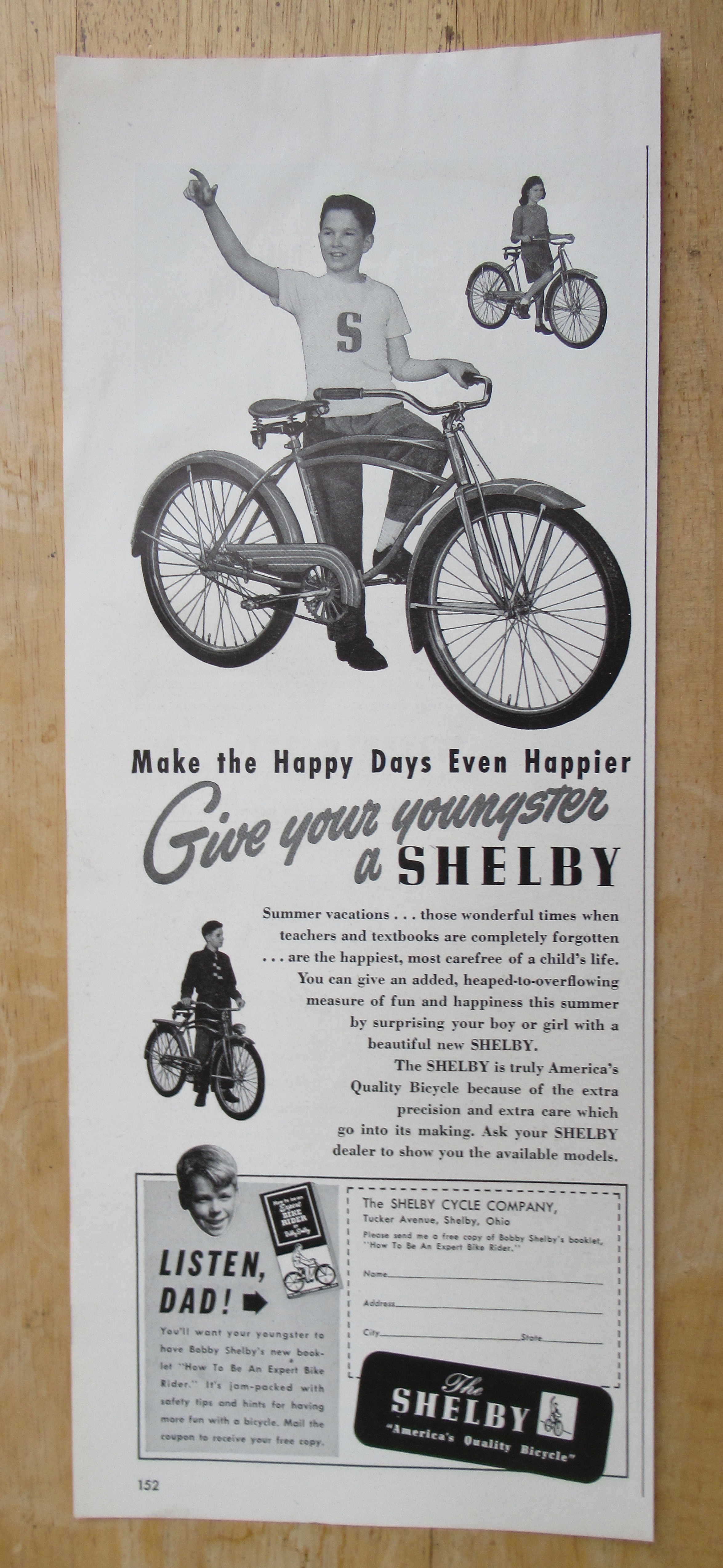 1947 Shelby Bicycle with Boy Standing By His Bike