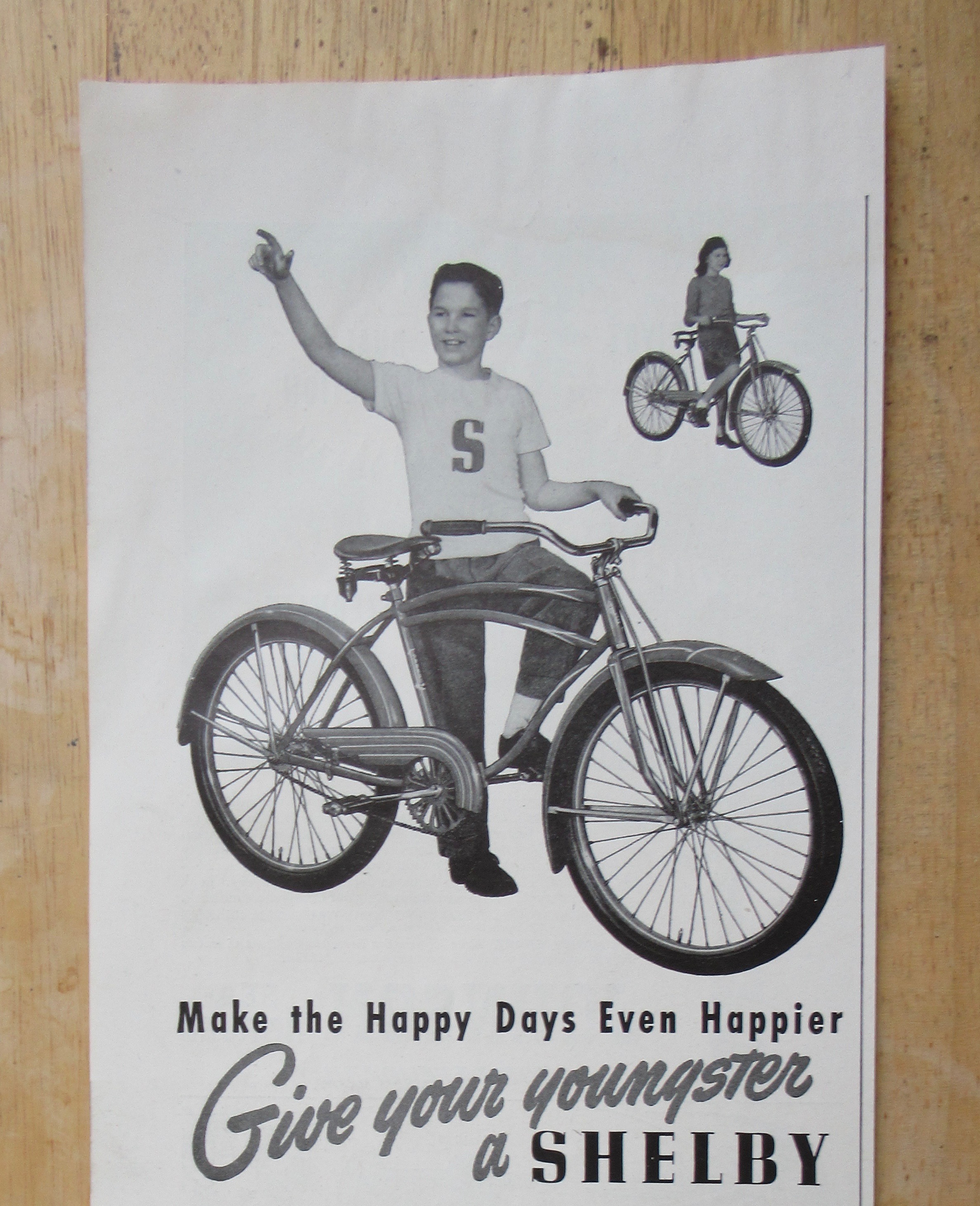 1947 Shelby Bicycle with Boy Standing By His Bike