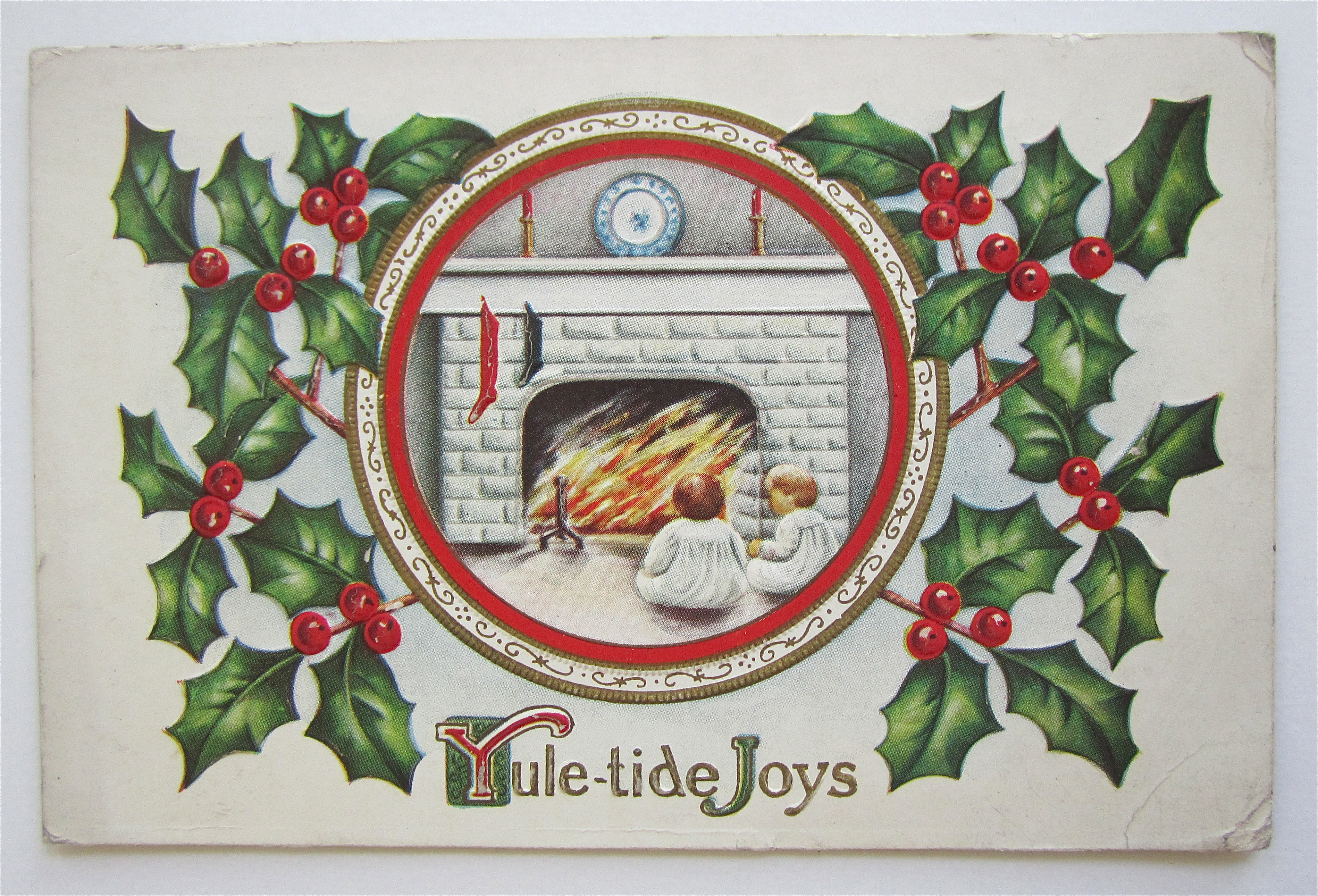 Children In Front Of Fireplace Christmas Postcard
