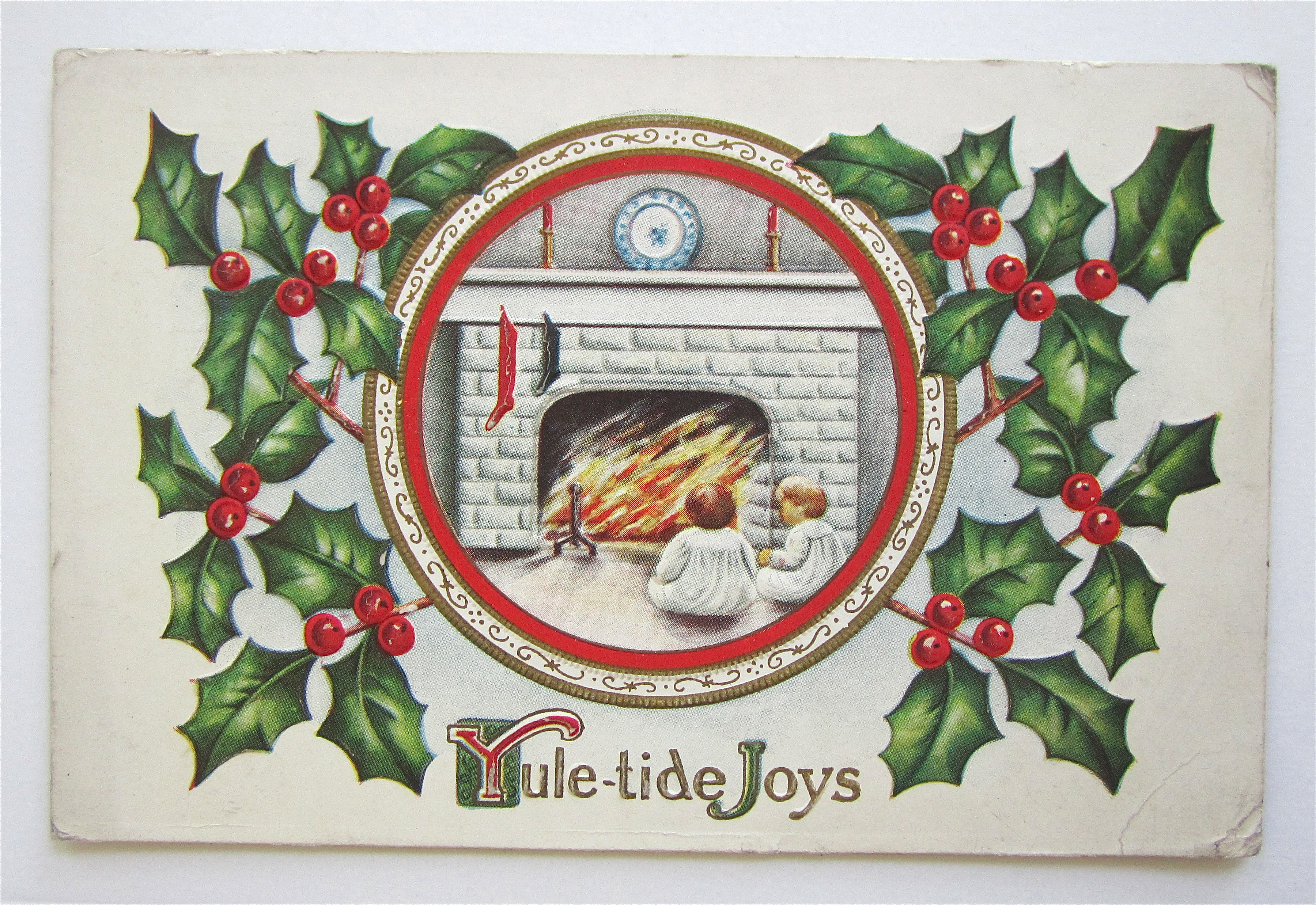 Children In Front Of Fireplace Christmas Postcard