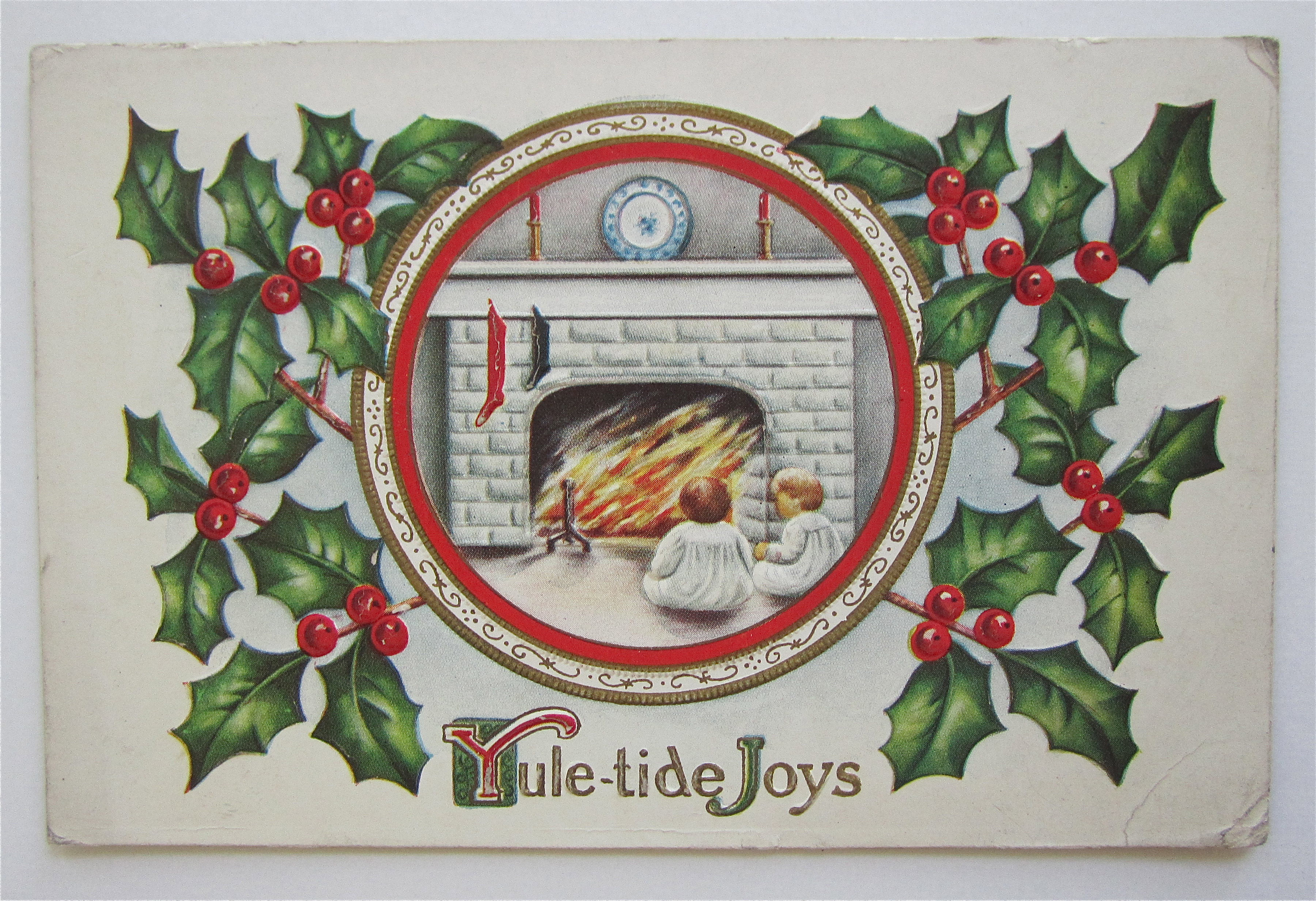 Children In Front Of Fireplace Christmas Postcard