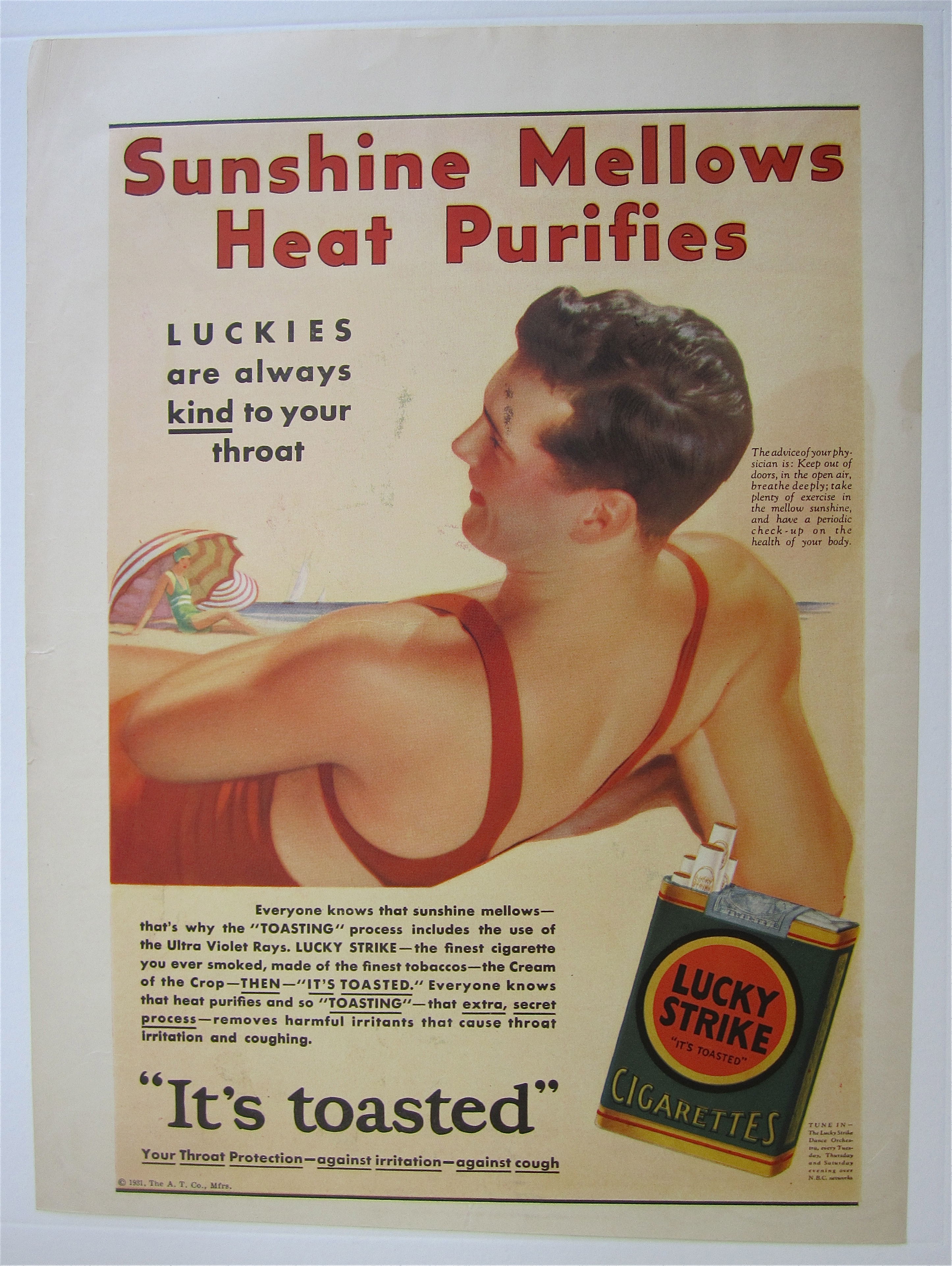 1931 Lucky Strike Cigarettes with Man Laying on Beach
