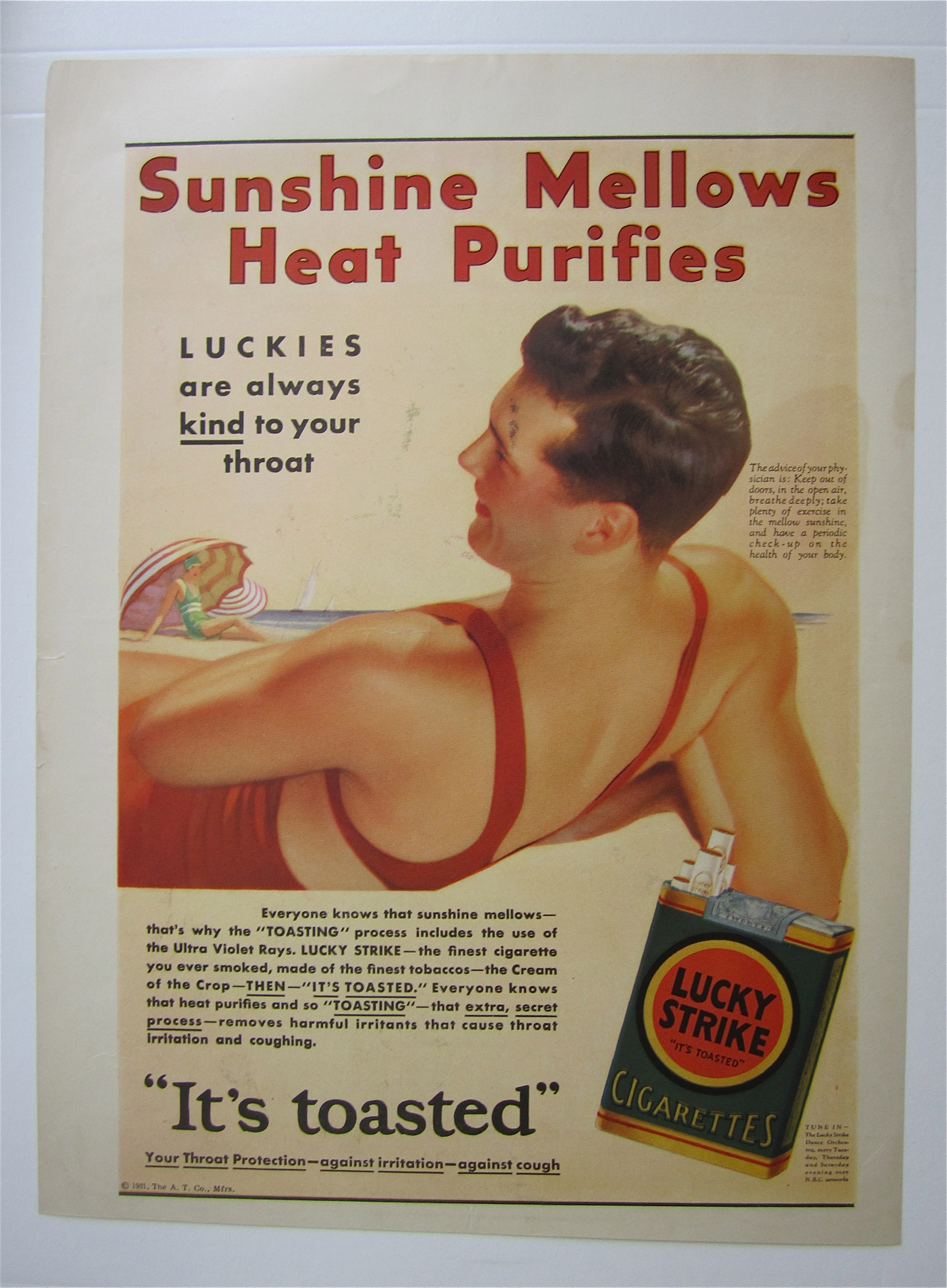 1931 Lucky Strike Cigarettes with Man Laying on Beach