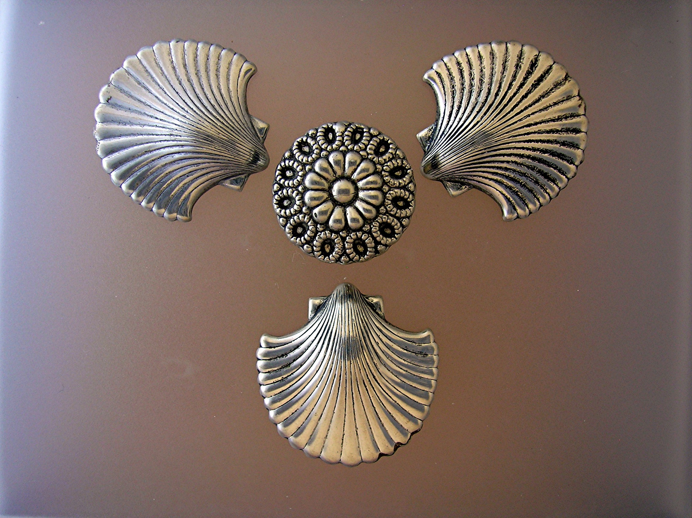4 Silvertone Shell Button Covers.