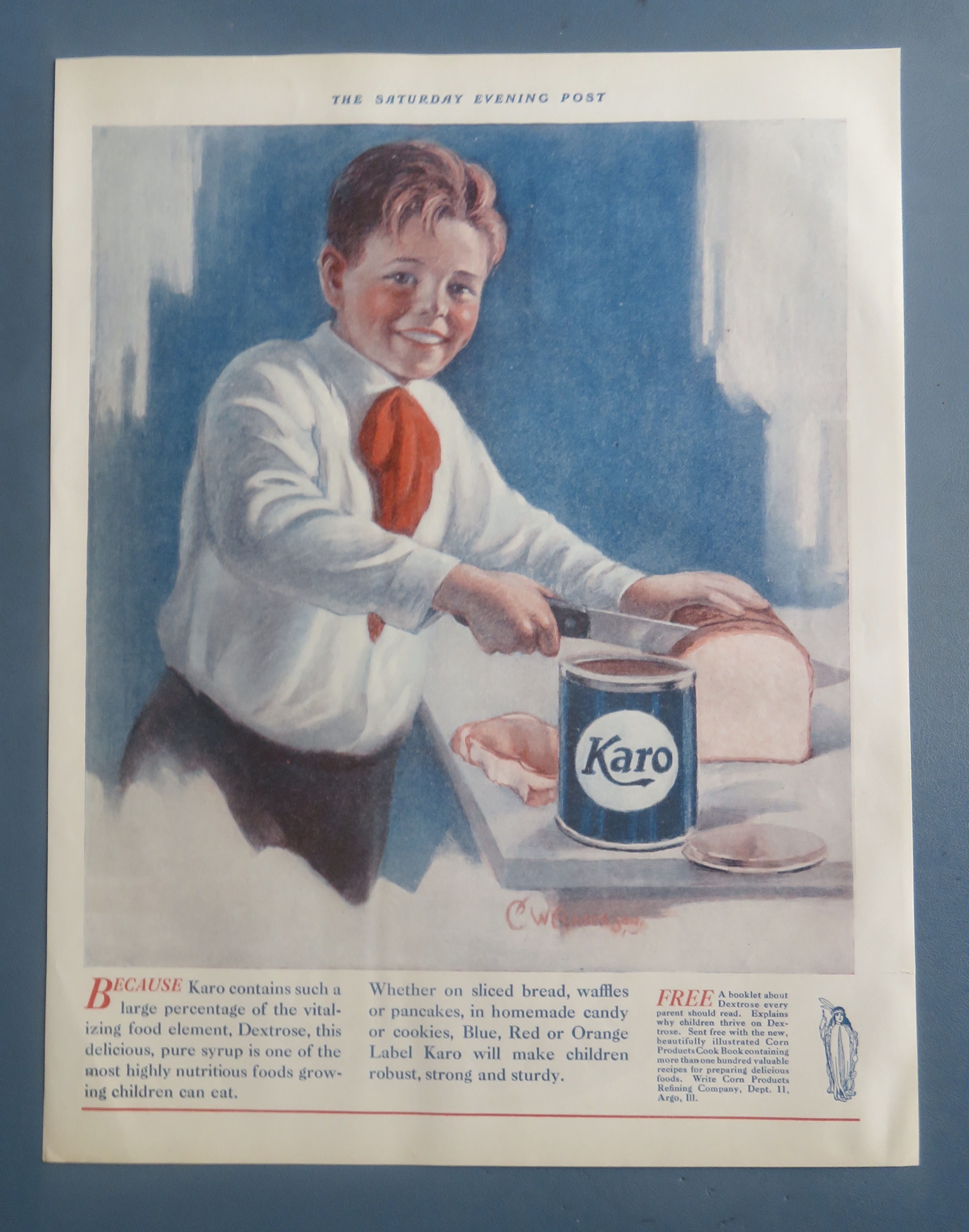 1925 Karo Syrup with Boy Cutting Bread