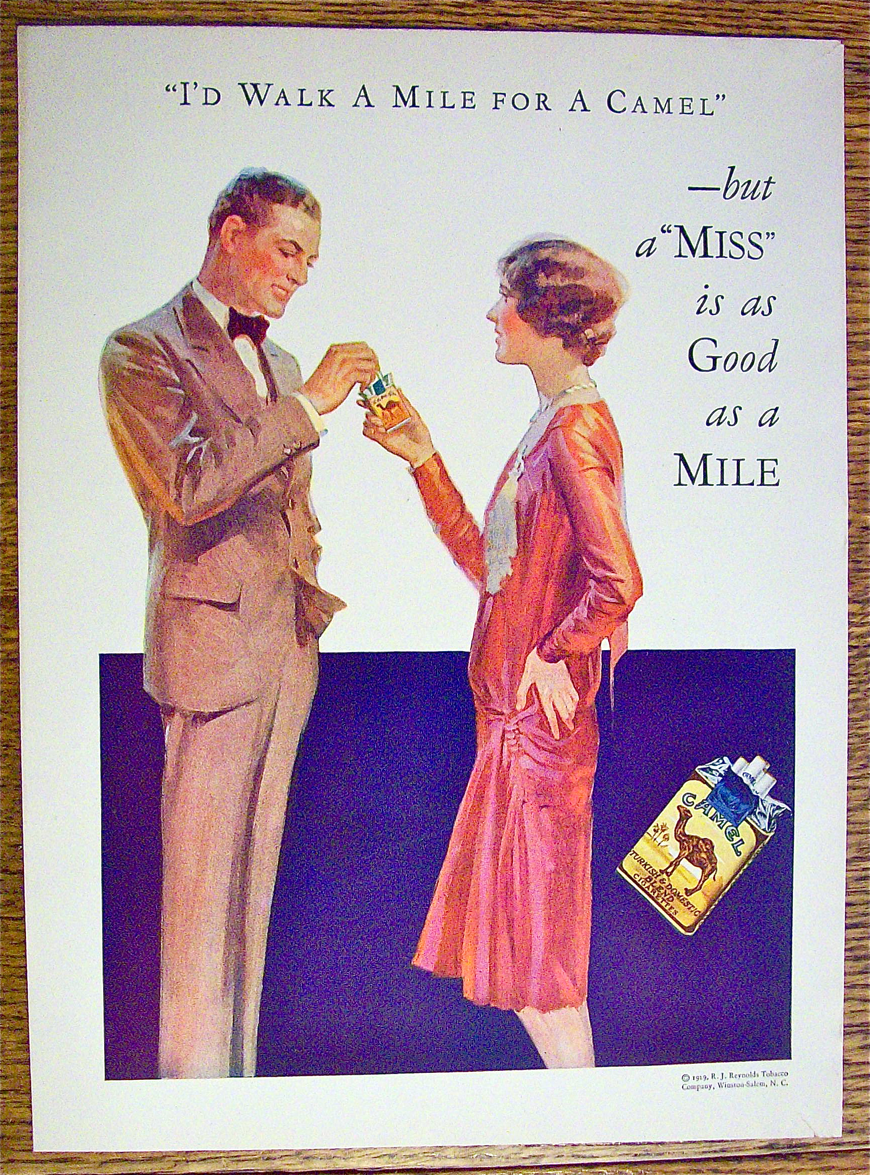 1929 Camel Cigarettes with Woman Giving Man Cigarette