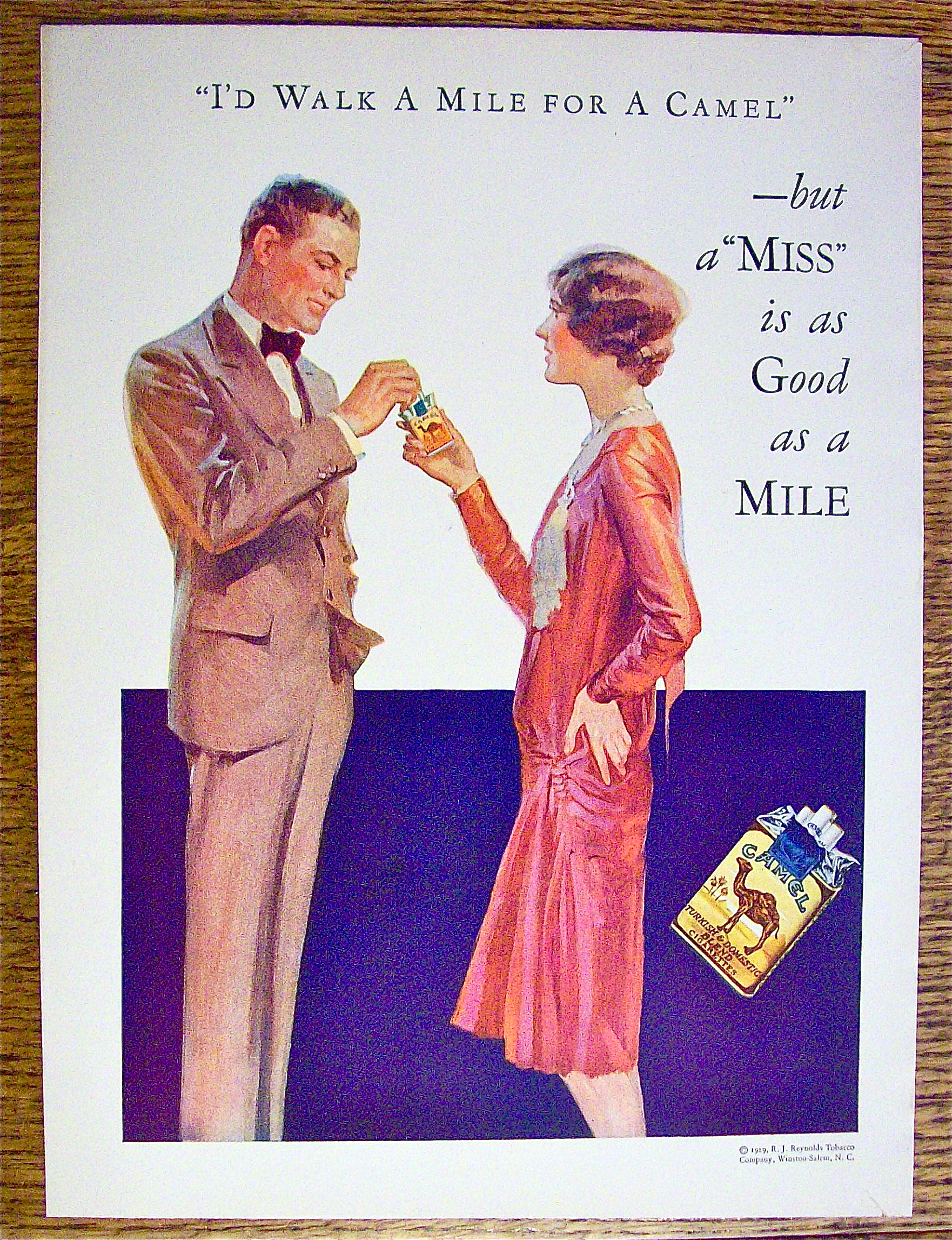1929 Camel Cigarettes with Woman Giving Man Cigarette