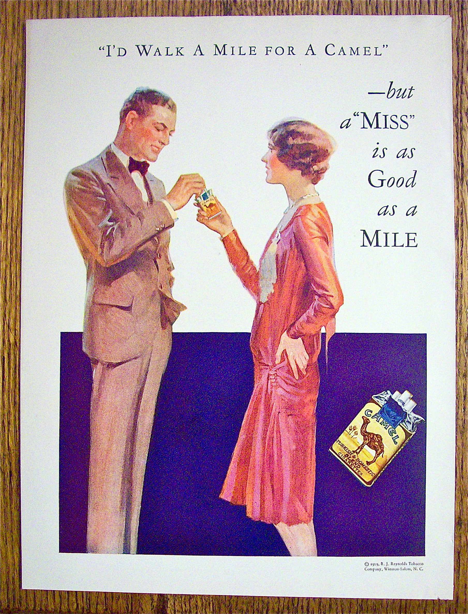 1929 Camel Cigarettes with Woman Giving Man Cigarette