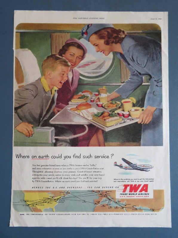 1952 TWA (Trans World Airlines) with Stewardess Serving Little Boy His Dinner