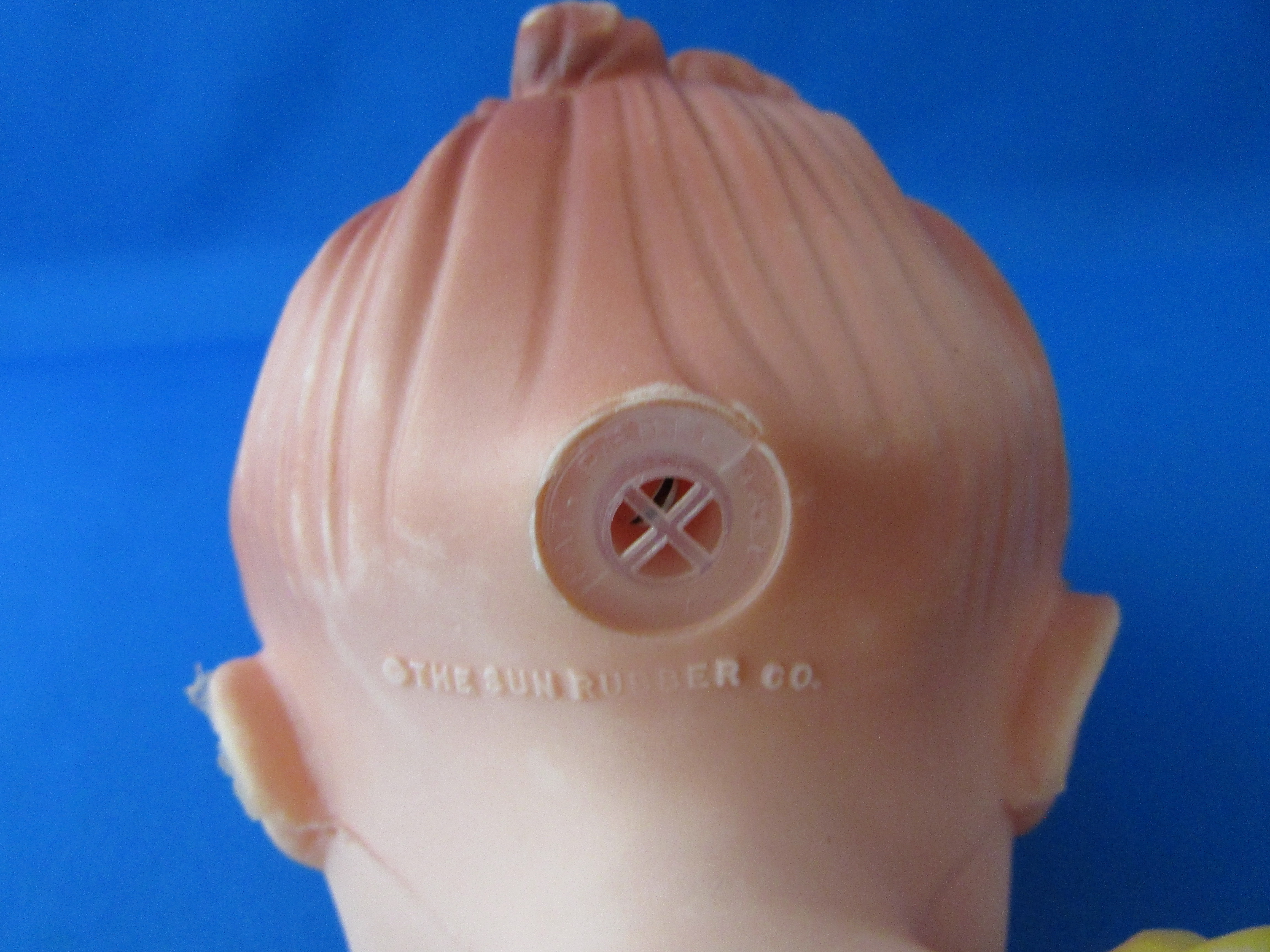 Sun Rubber Squeaky Doll