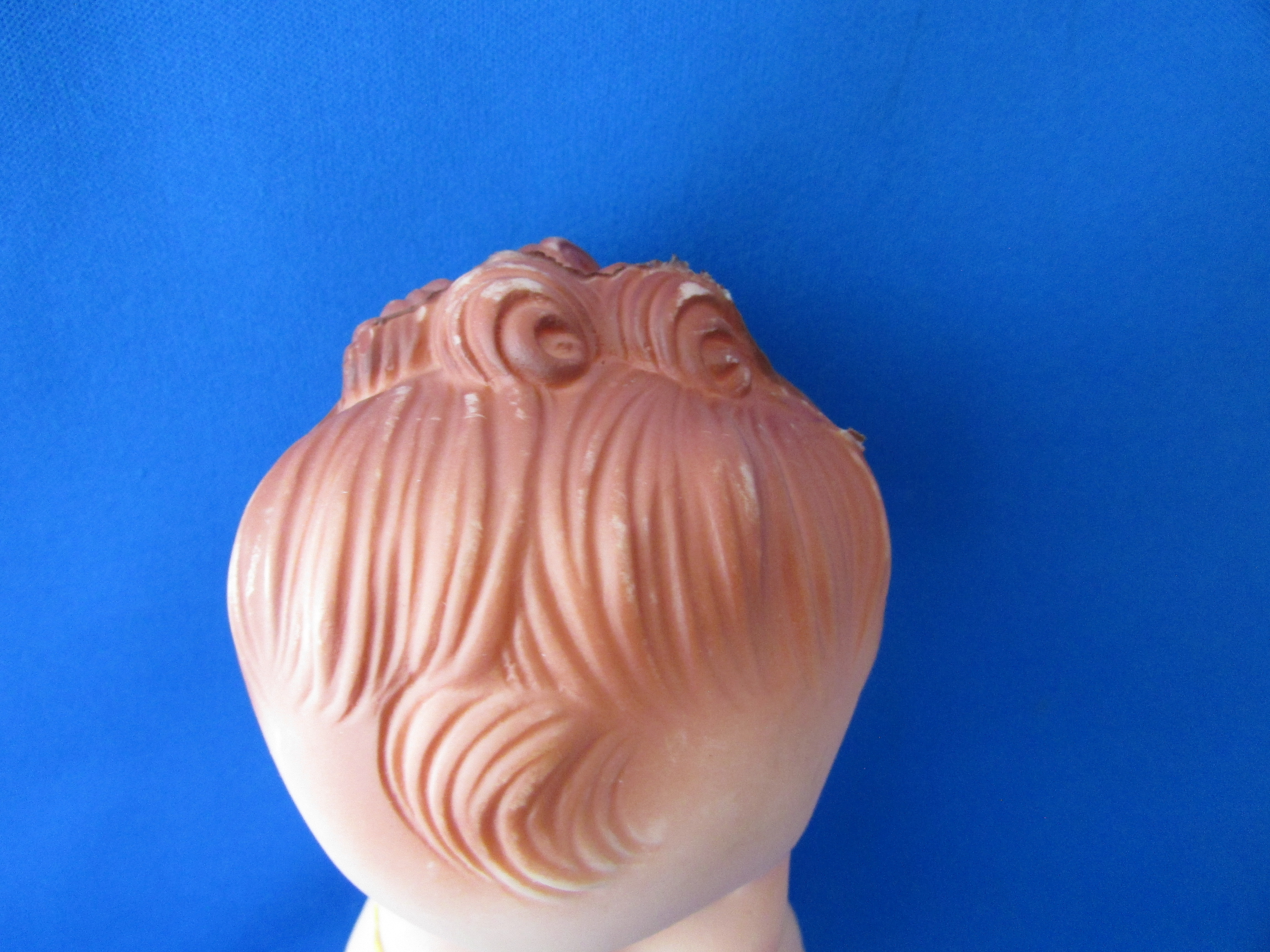 Sun Rubber Squeaky Doll