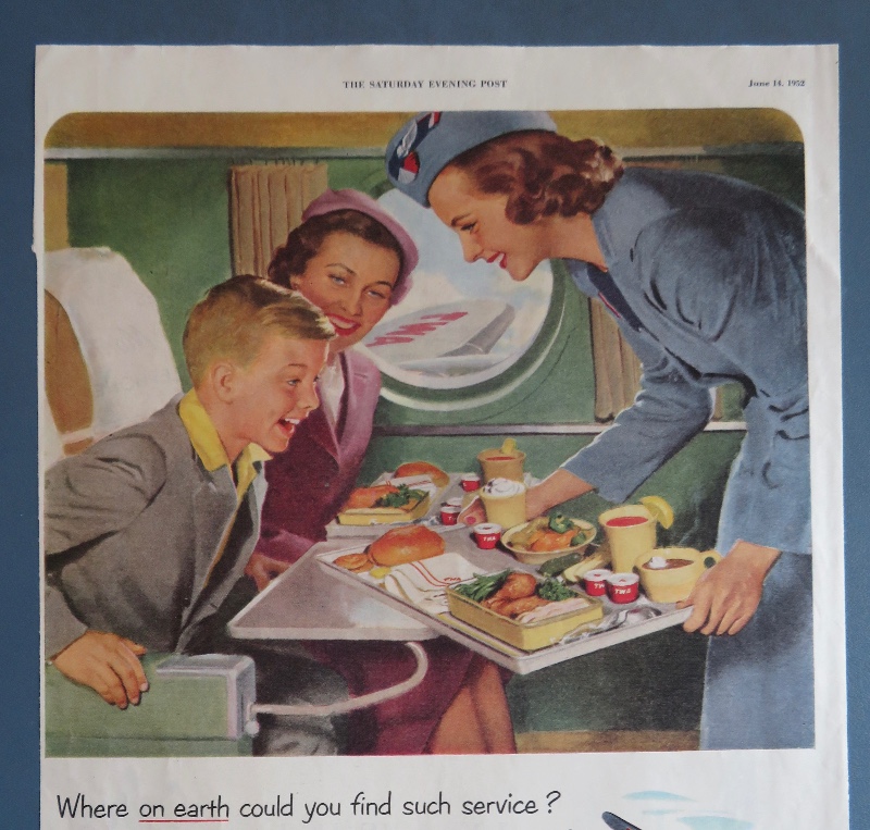 1952 TWA (Trans World Airlines) with Stewardess Serving Little Boy His Dinner