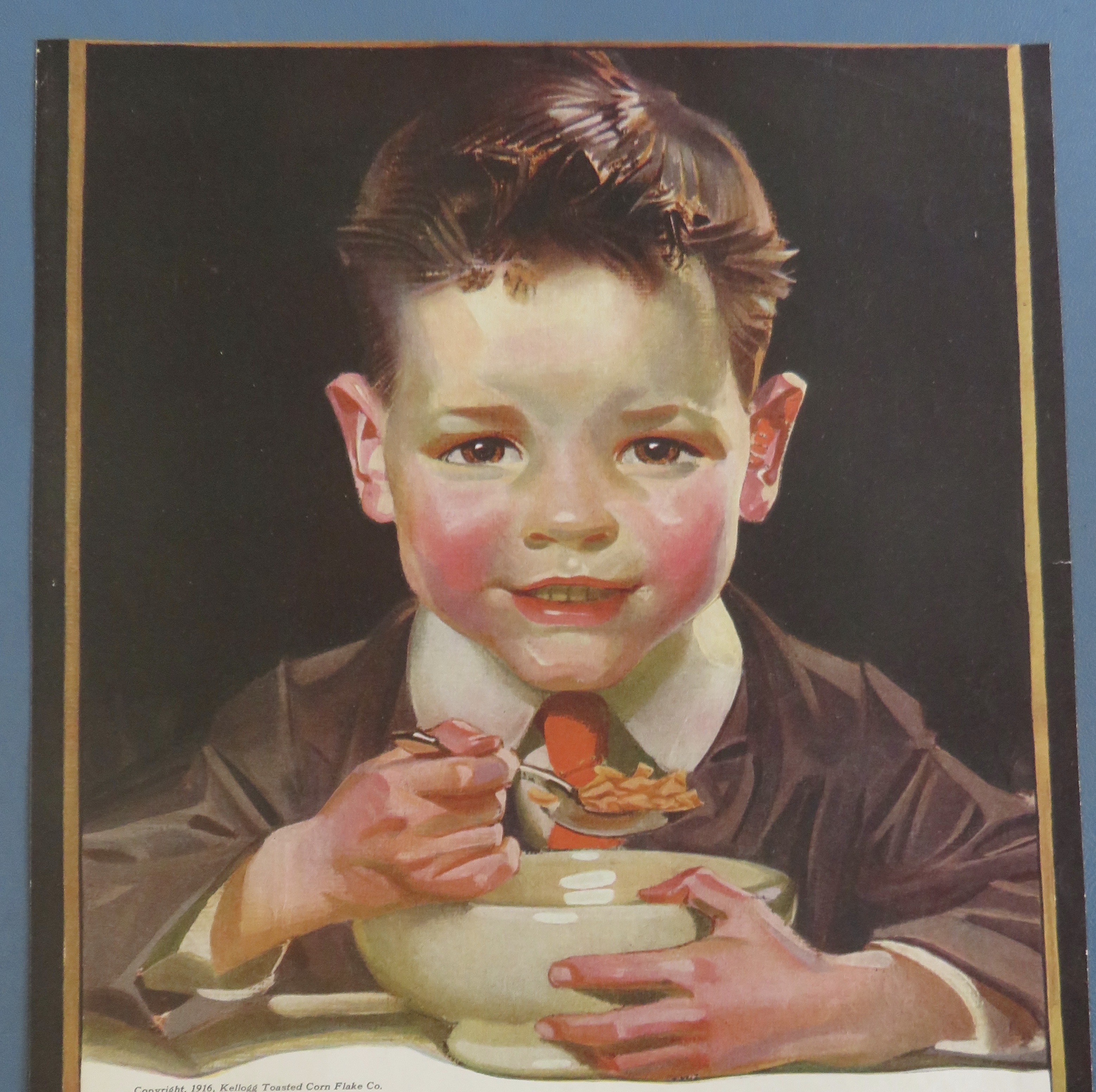 1916 Kellogg's Toasted Corn Flakes w/Boy Eating Cereal
