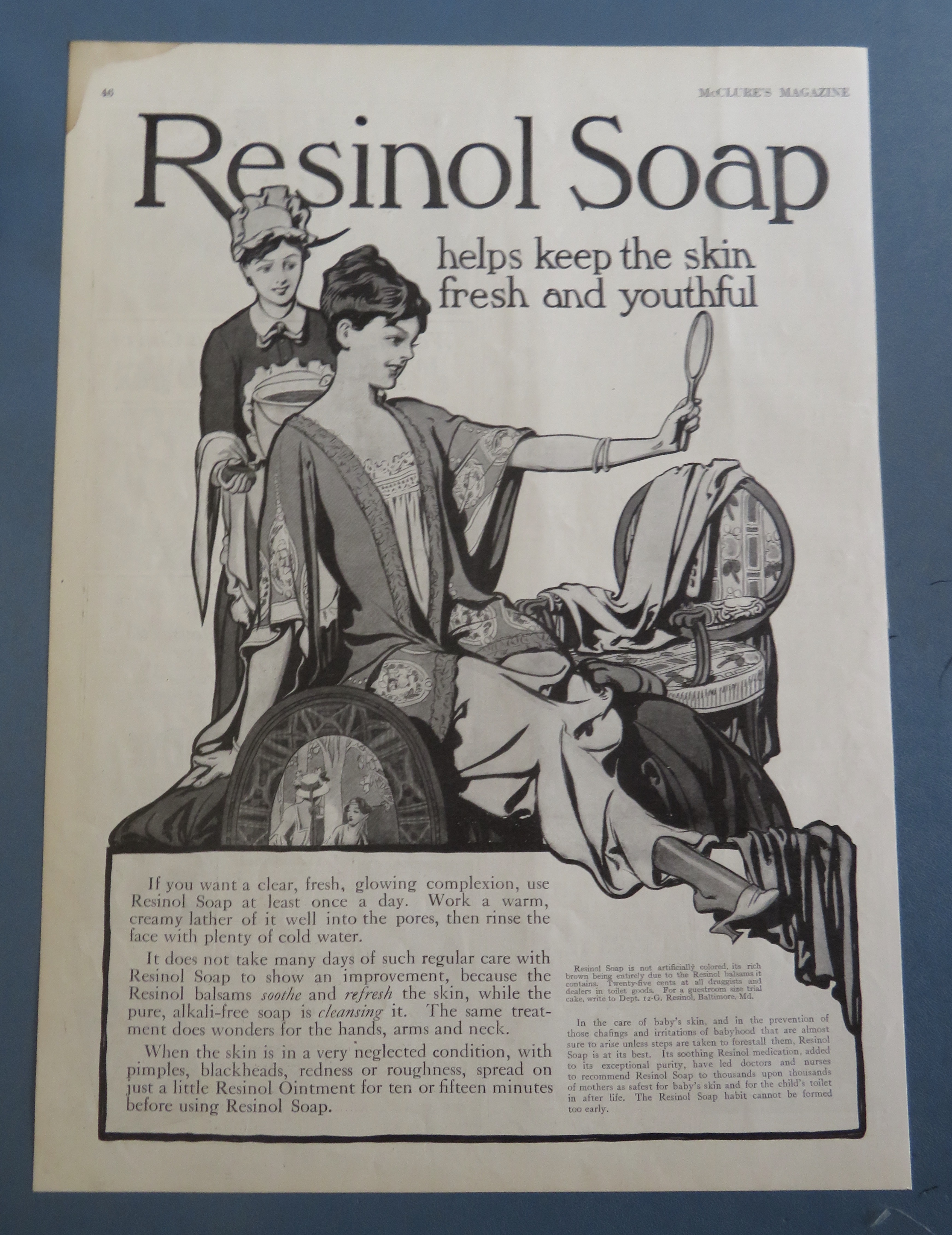 1915 Resinol Soap with Woman Looking In A Mirror