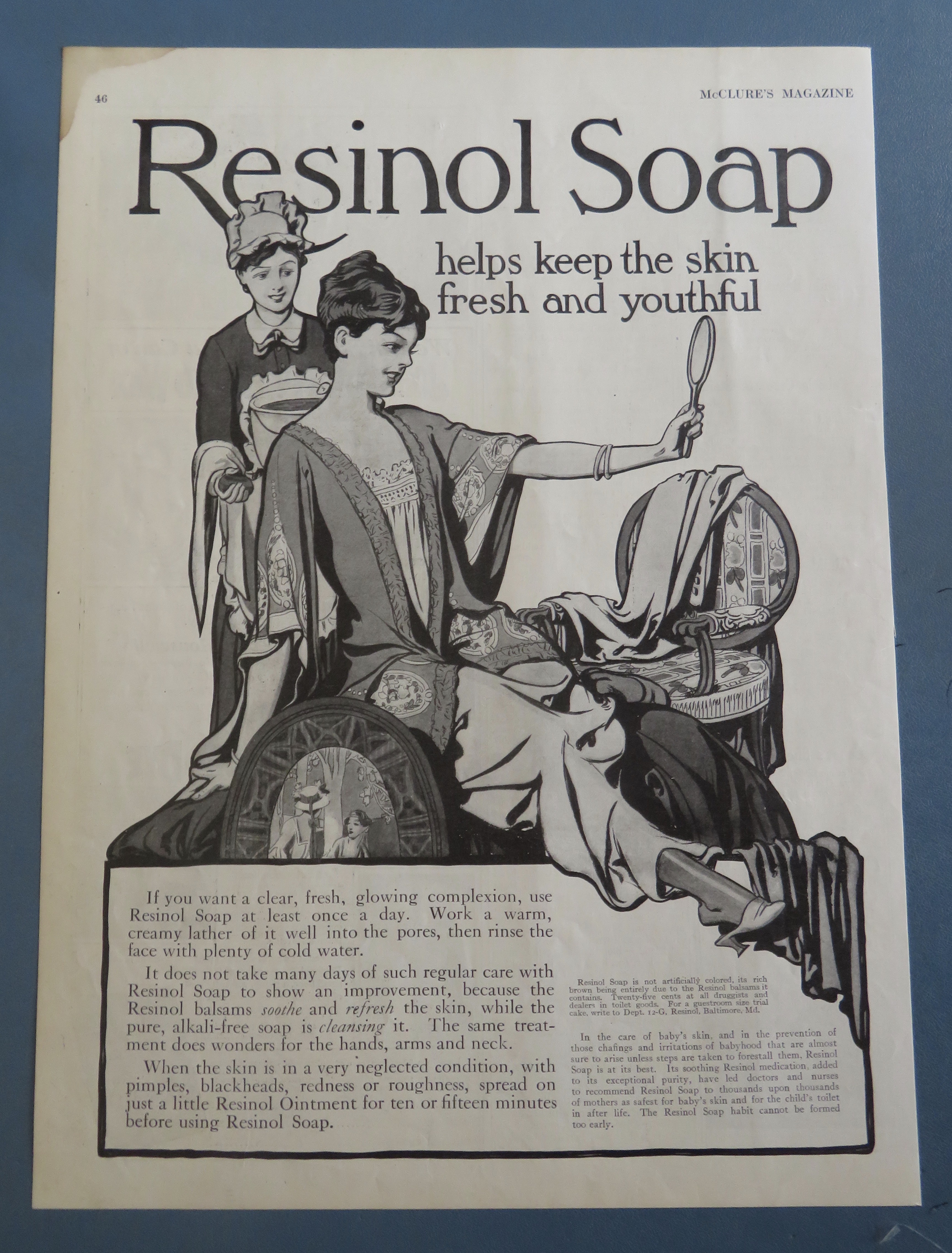 1915 Resinol Soap with Woman Looking In A Mirror