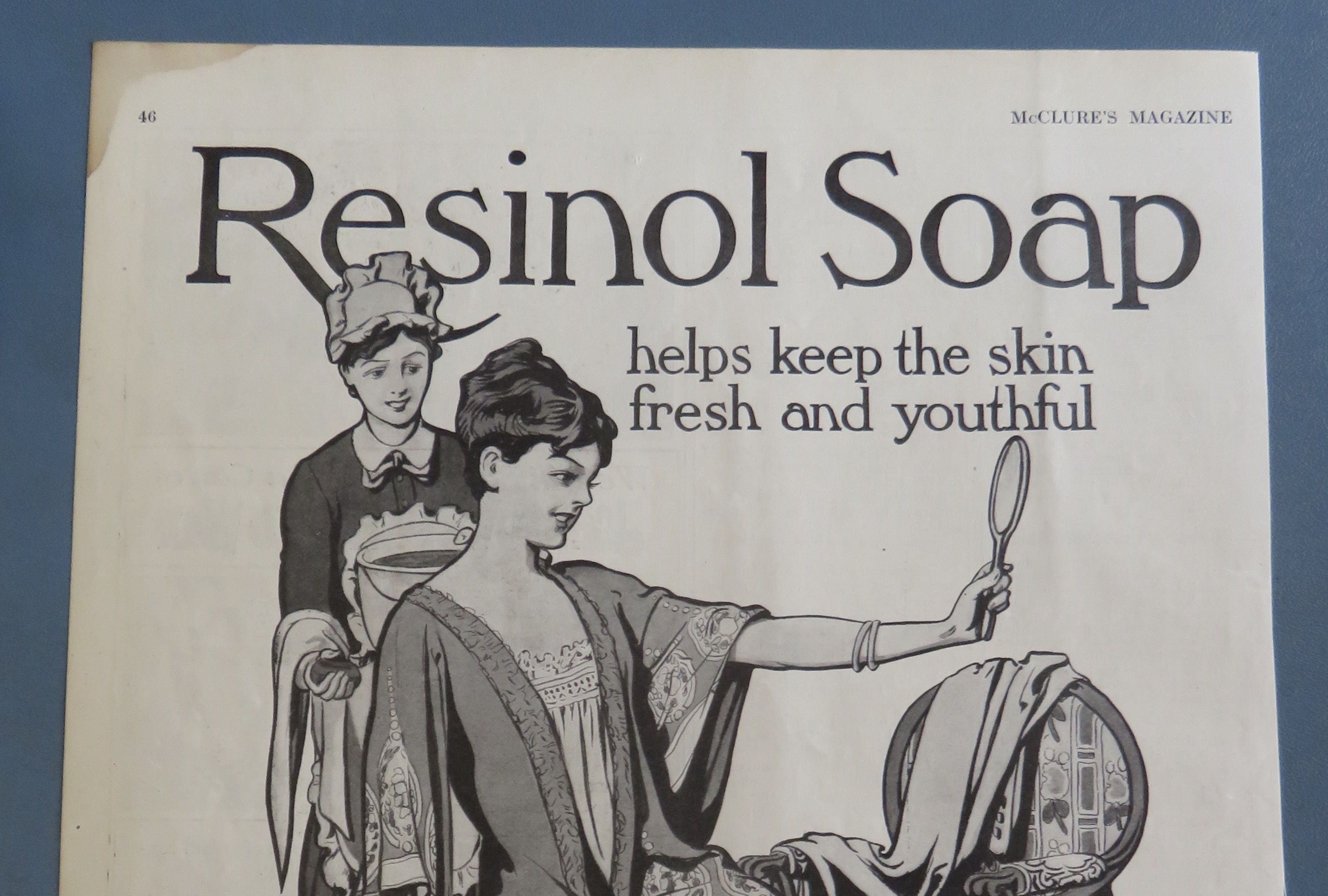 1915 Resinol Soap with Woman Looking In A Mirror