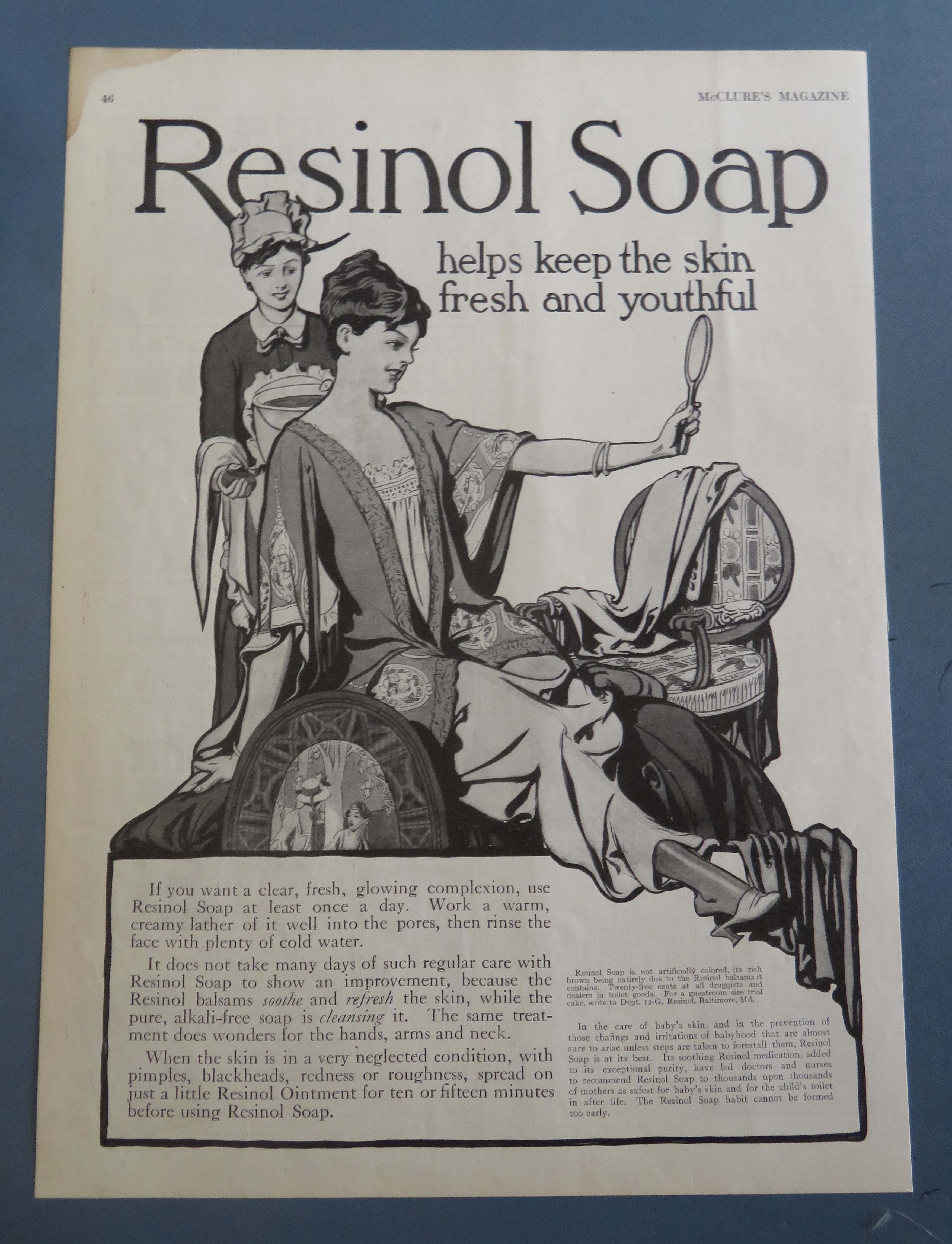 1915 Resinol Soap with Woman Looking In A Mirror